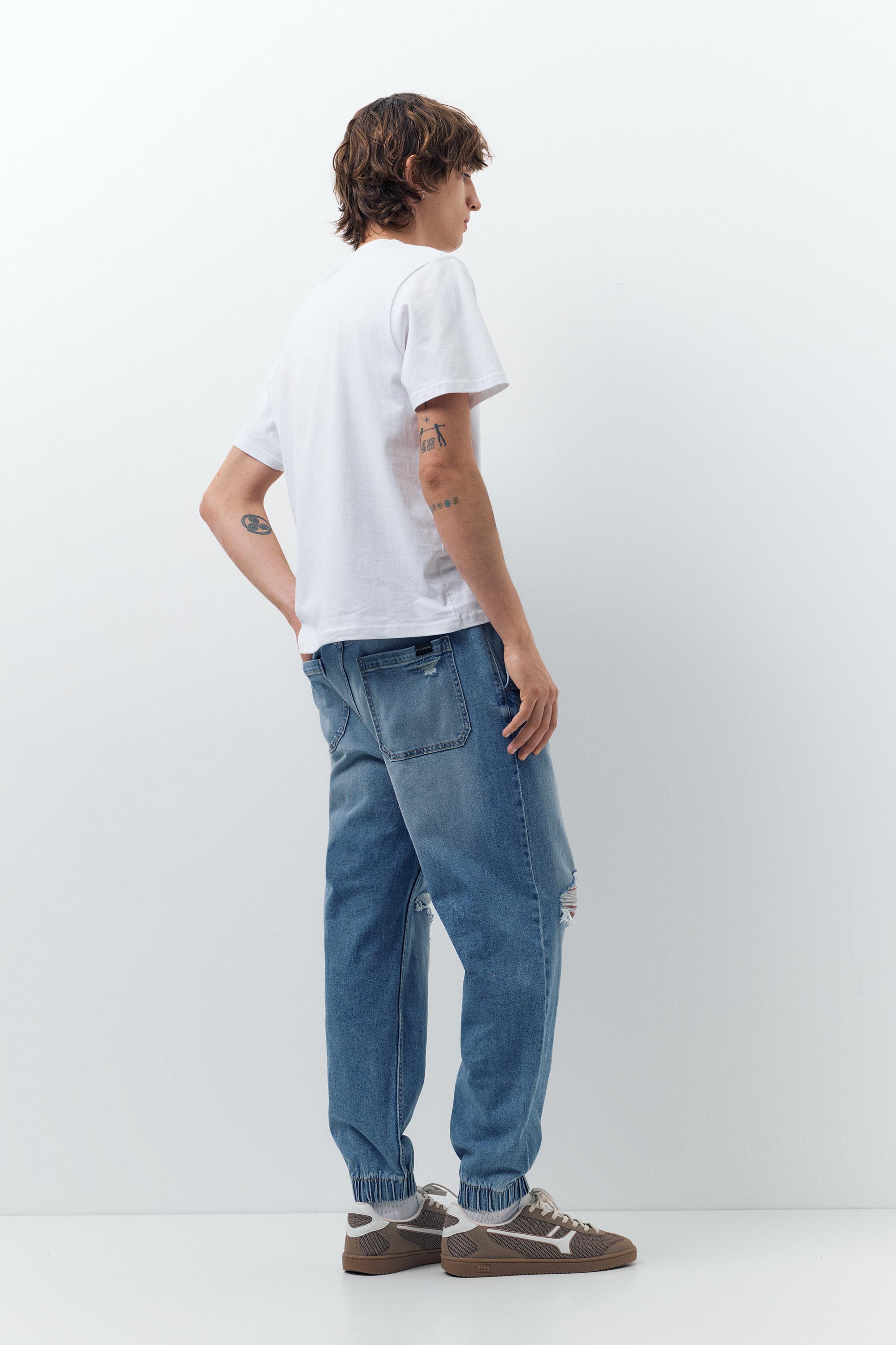 Ripped denim jogger trousers — Pale indigo