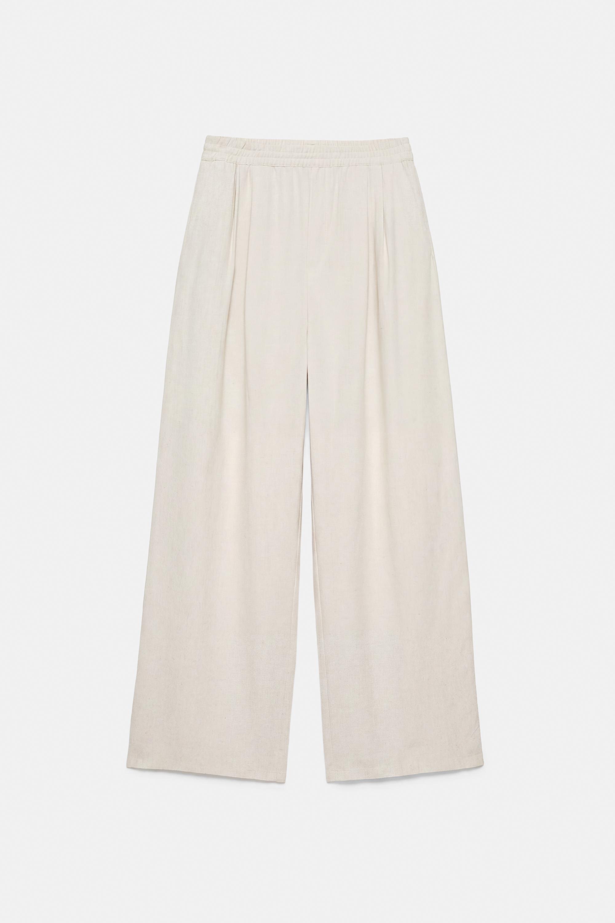 Flowing darted trousers — Sand