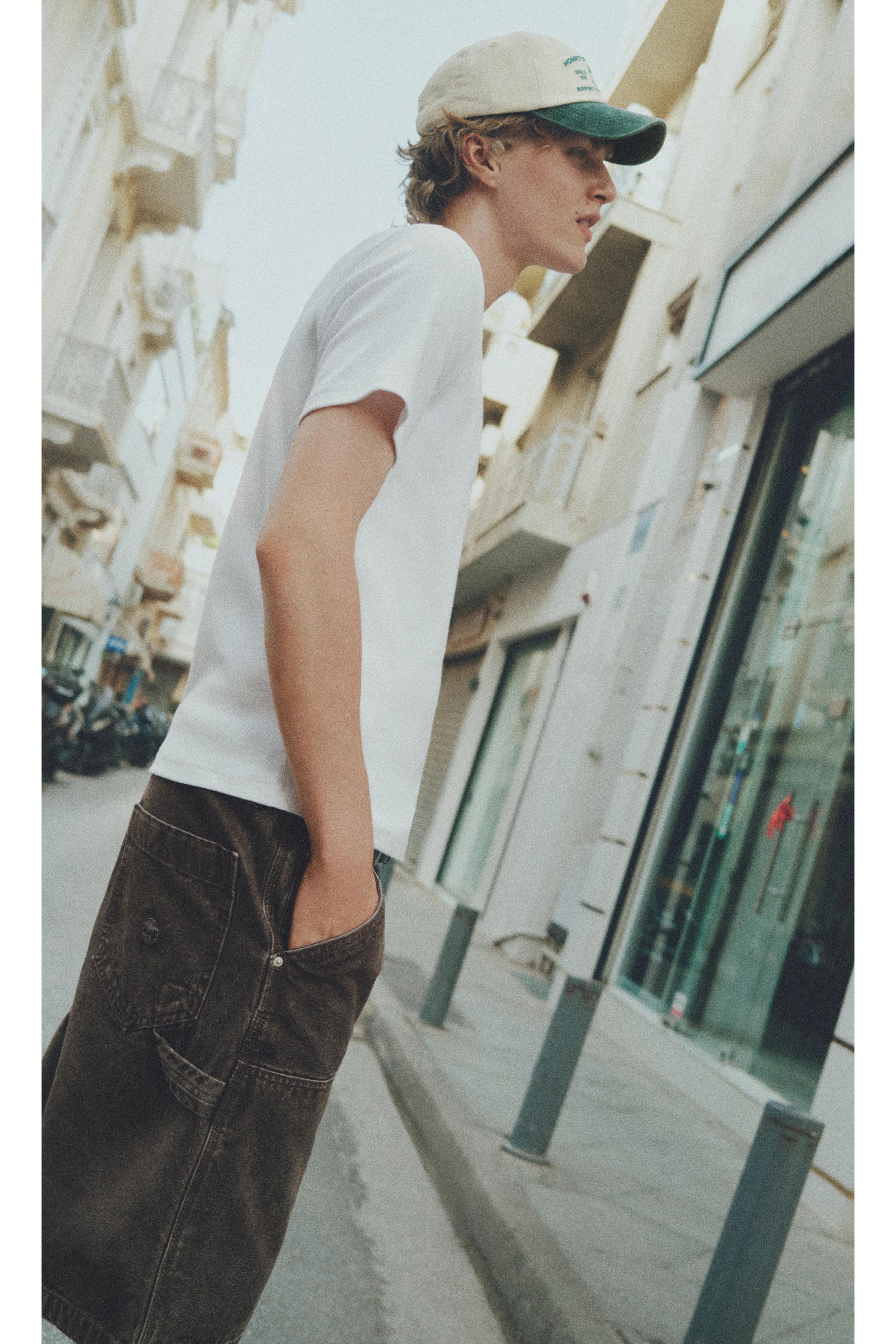 Short sleeve zip-up polo shirt — Off white