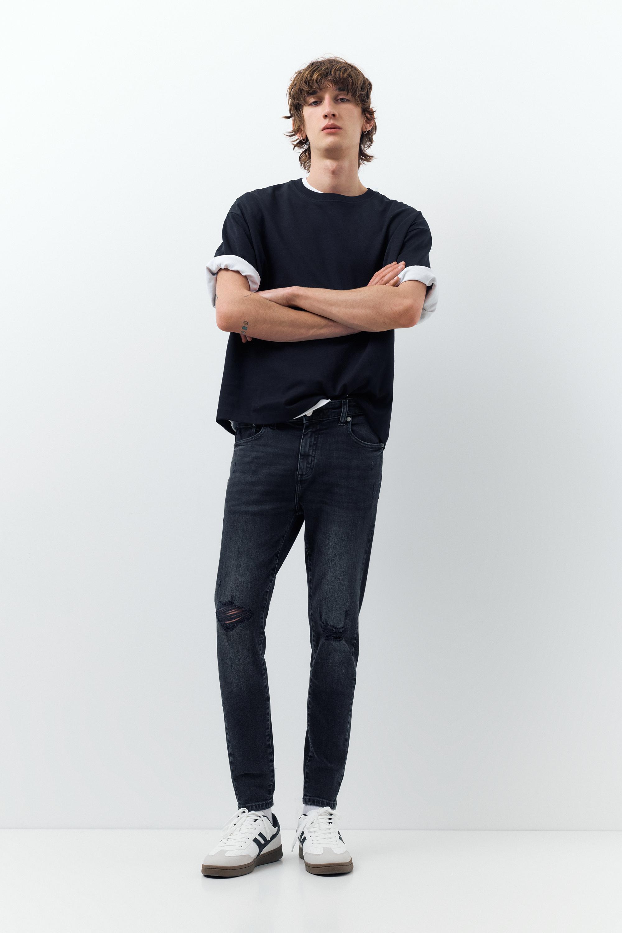 Ripped skinny jeans — Faded black