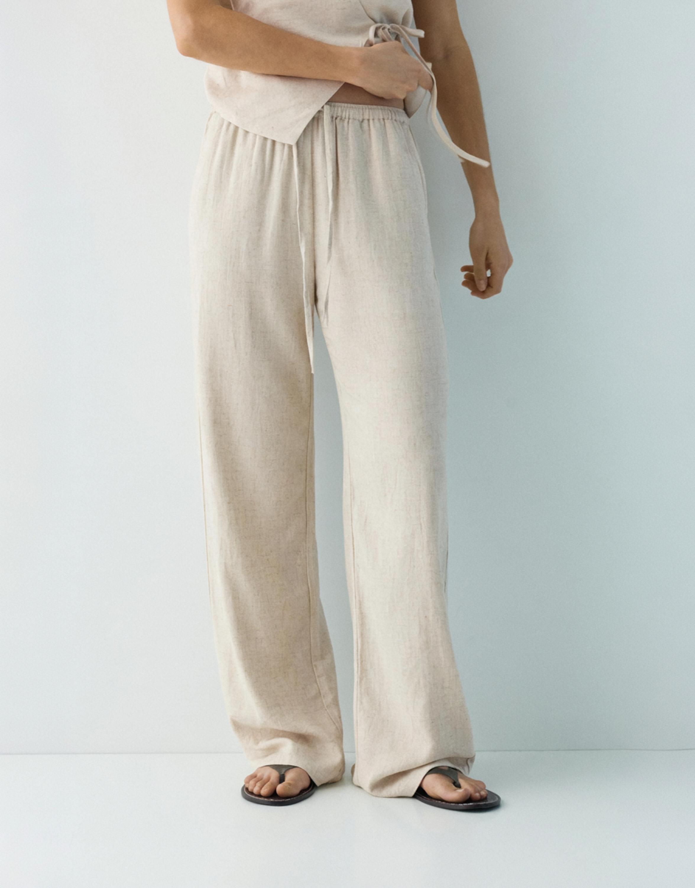 Flowy trousers with linen — Beige