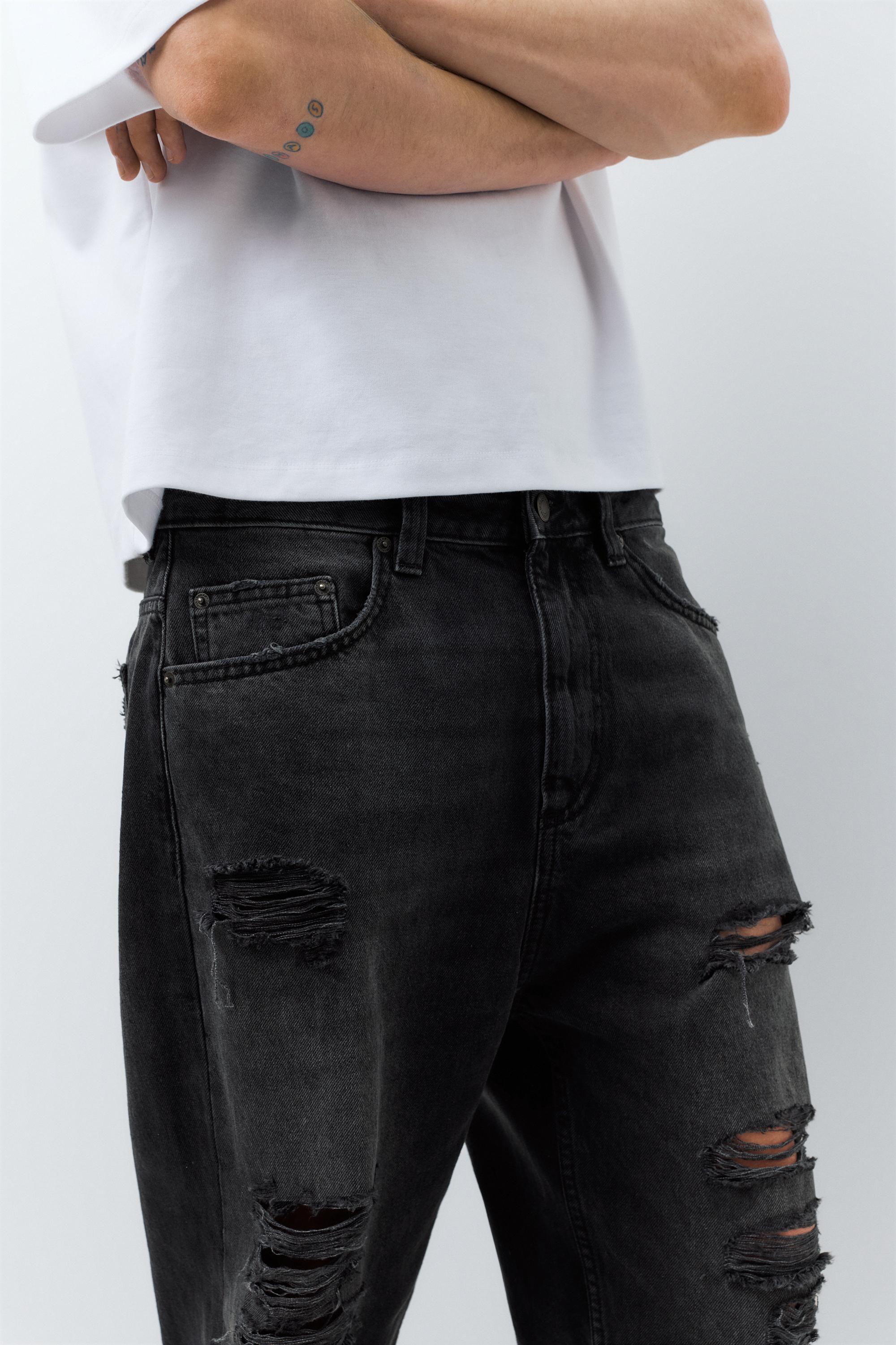Relaxed fit ripped jeans — Faded black