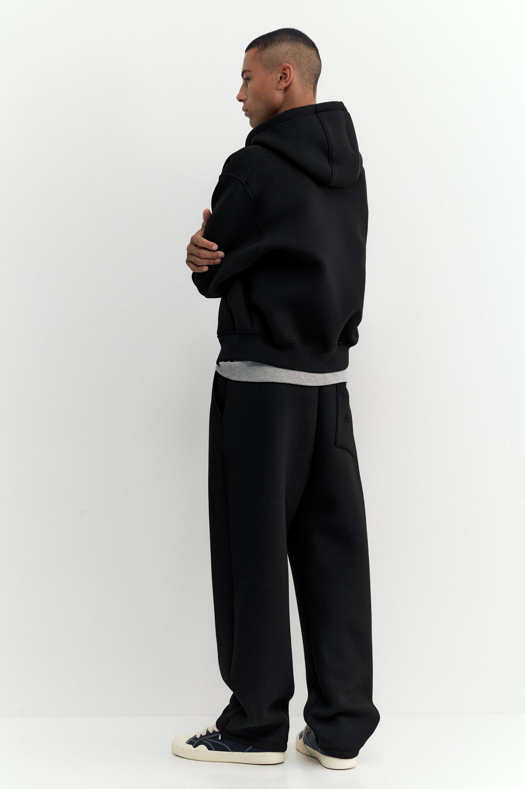 Neoprene-effect baggy trousers — Black