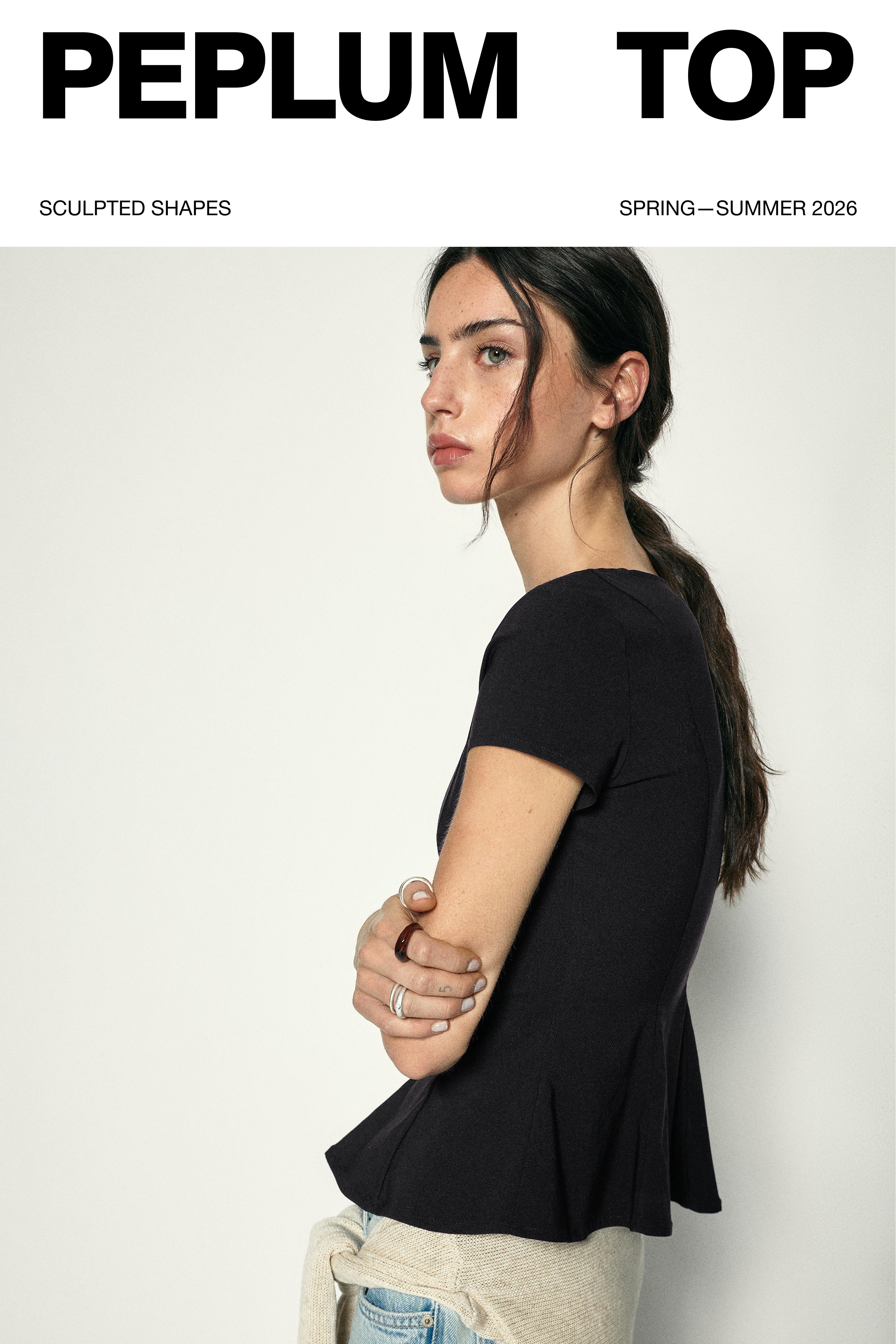Peplum top — Black