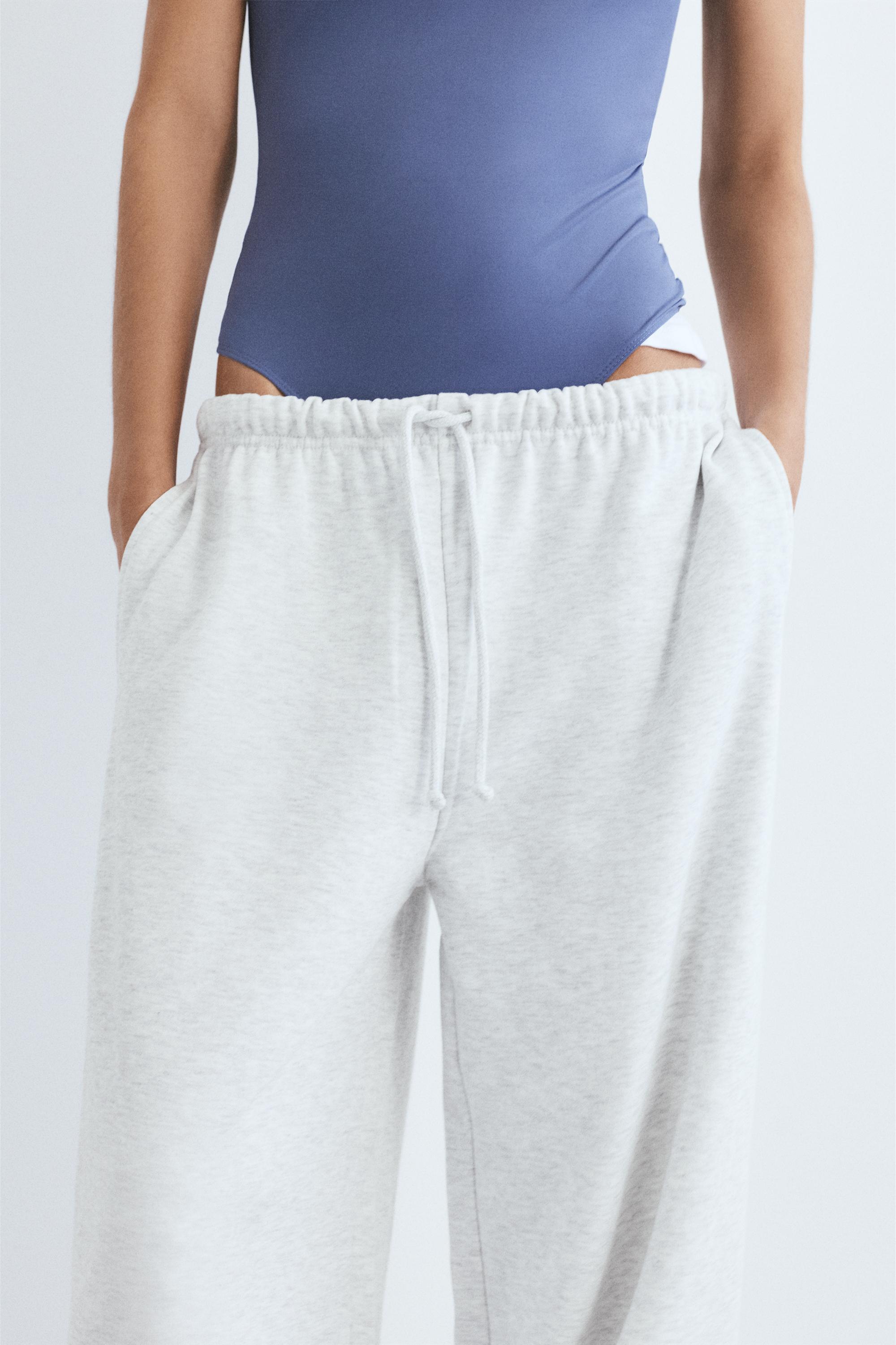 Wide-leg tracksuit bottoms with adjustable hem — Grey marl