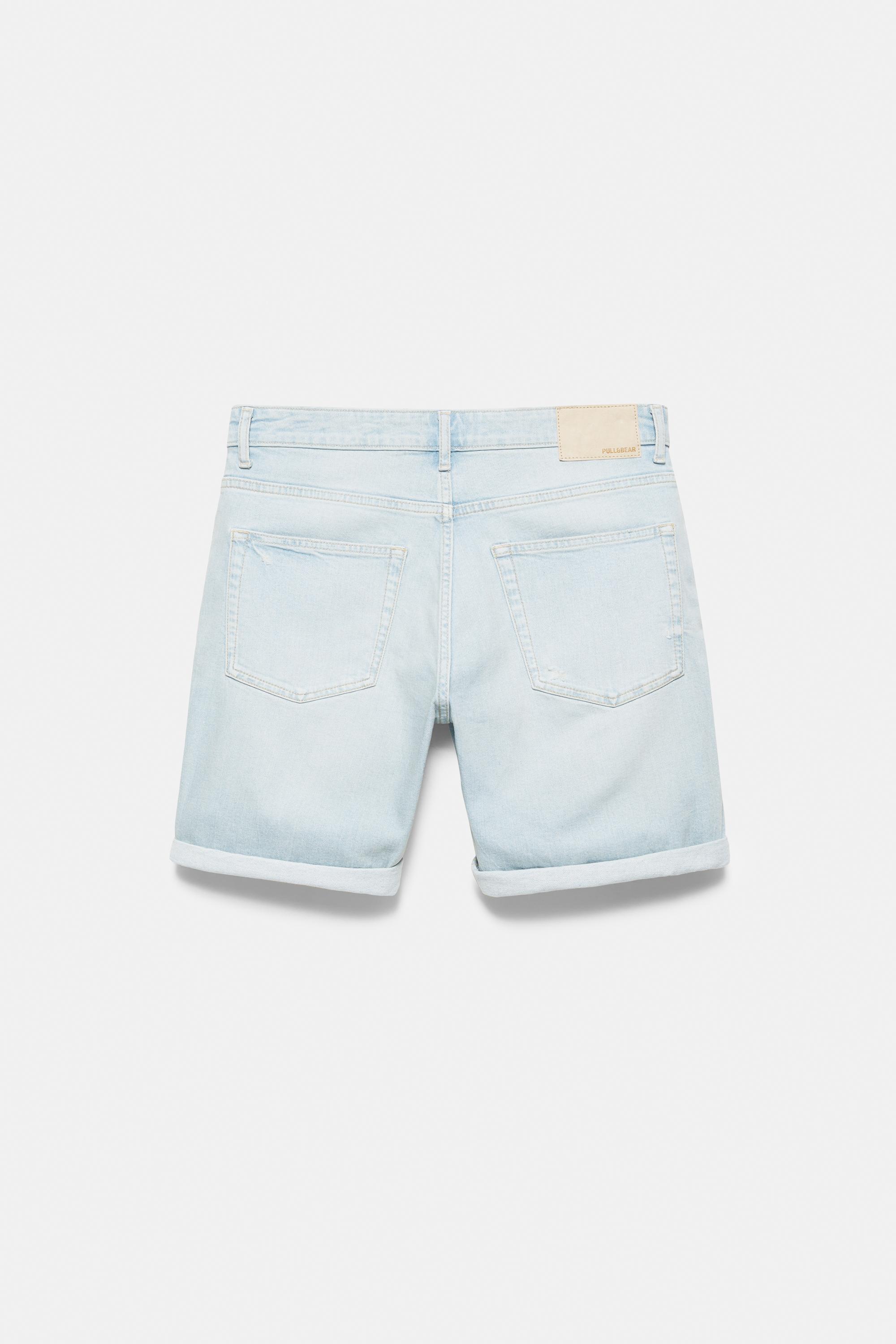 Ripped denim Bermuda shorts — Pale indigo