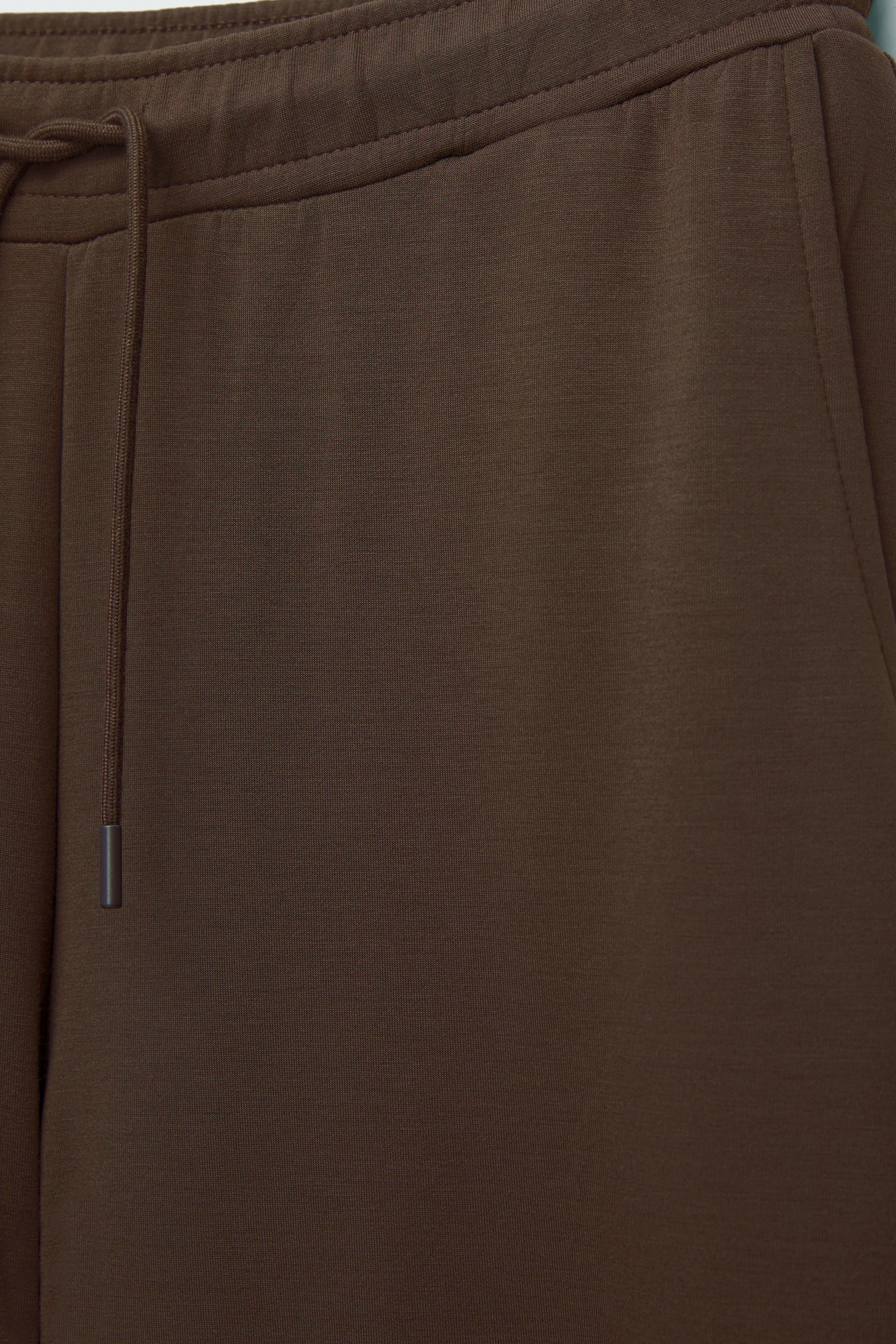 Yumuşak dokunuşlu geniş paça pantolon - Görsel 46