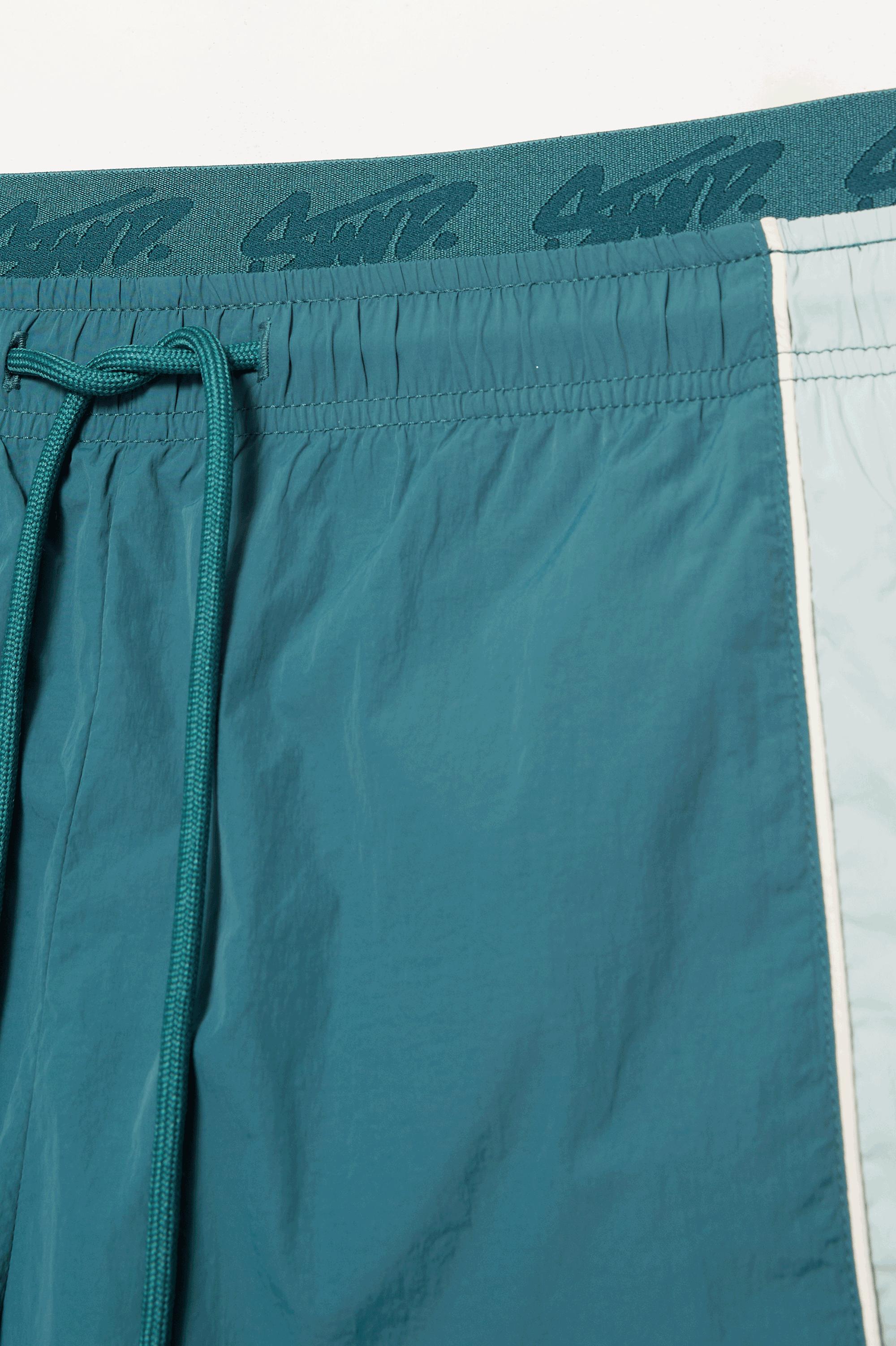 Panelled swimming trunks — Green (alternate view)