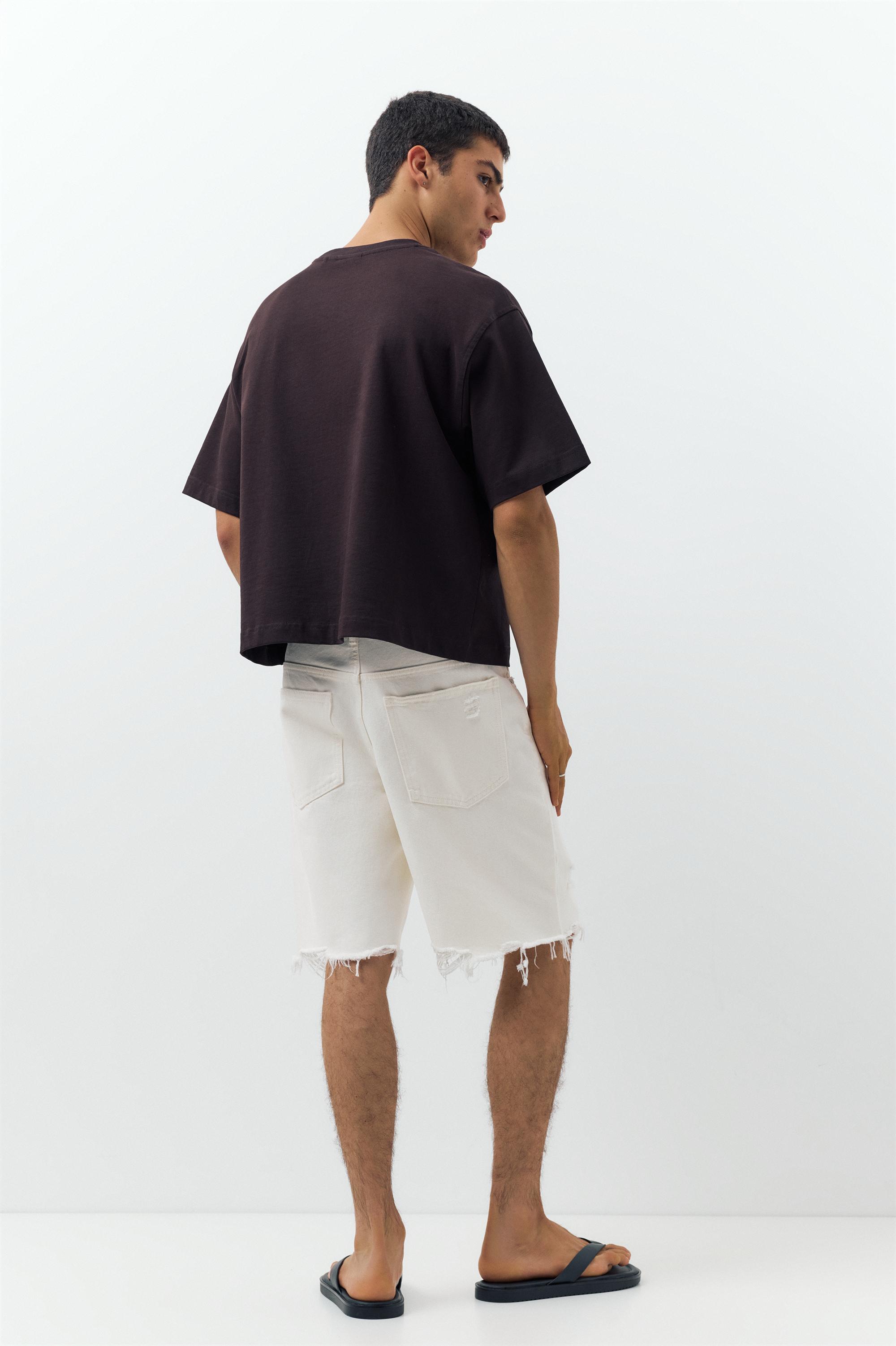 Straight-leg denim Bermuda shorts — Ecru