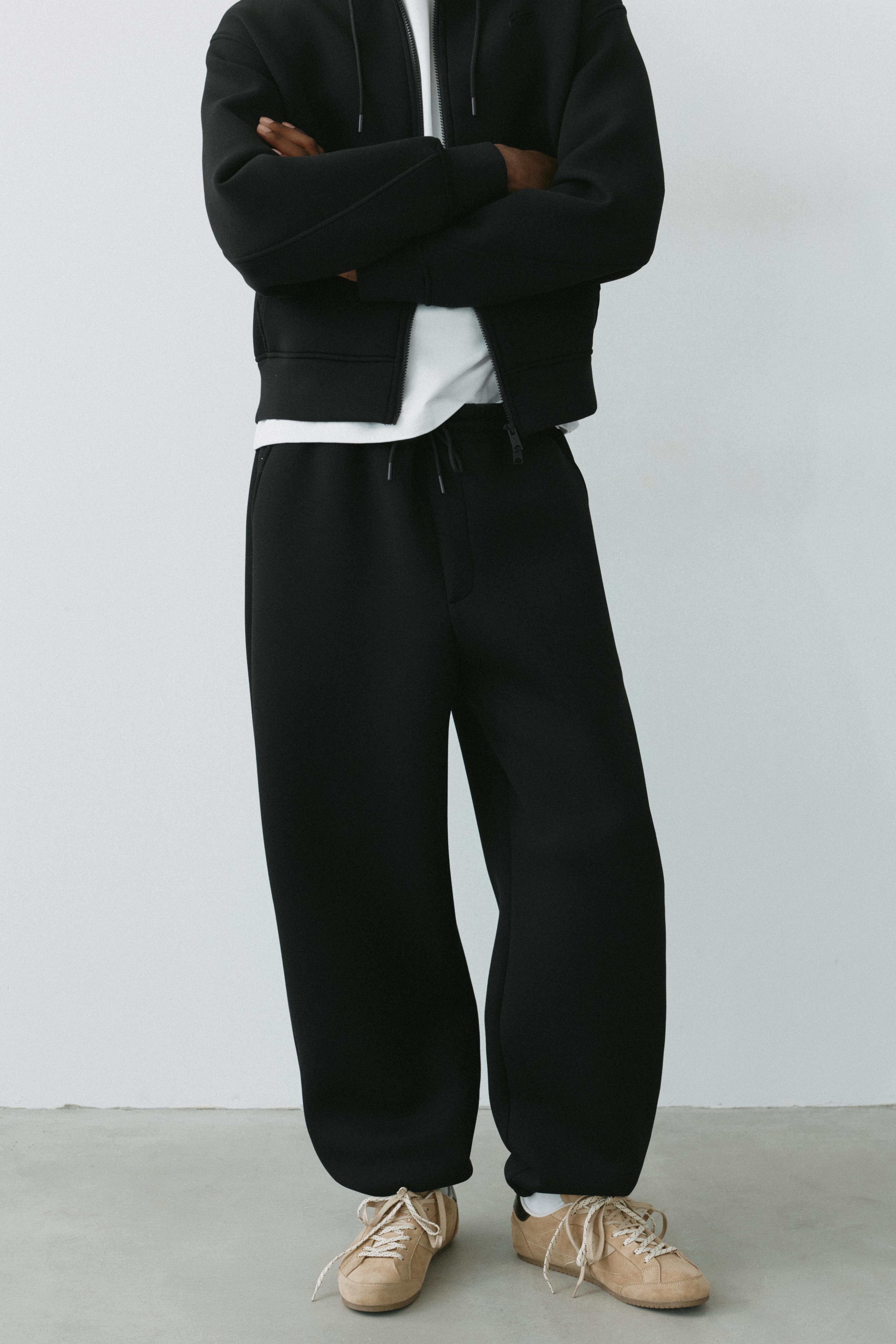 Neoprene-effect baggy trousers — Black