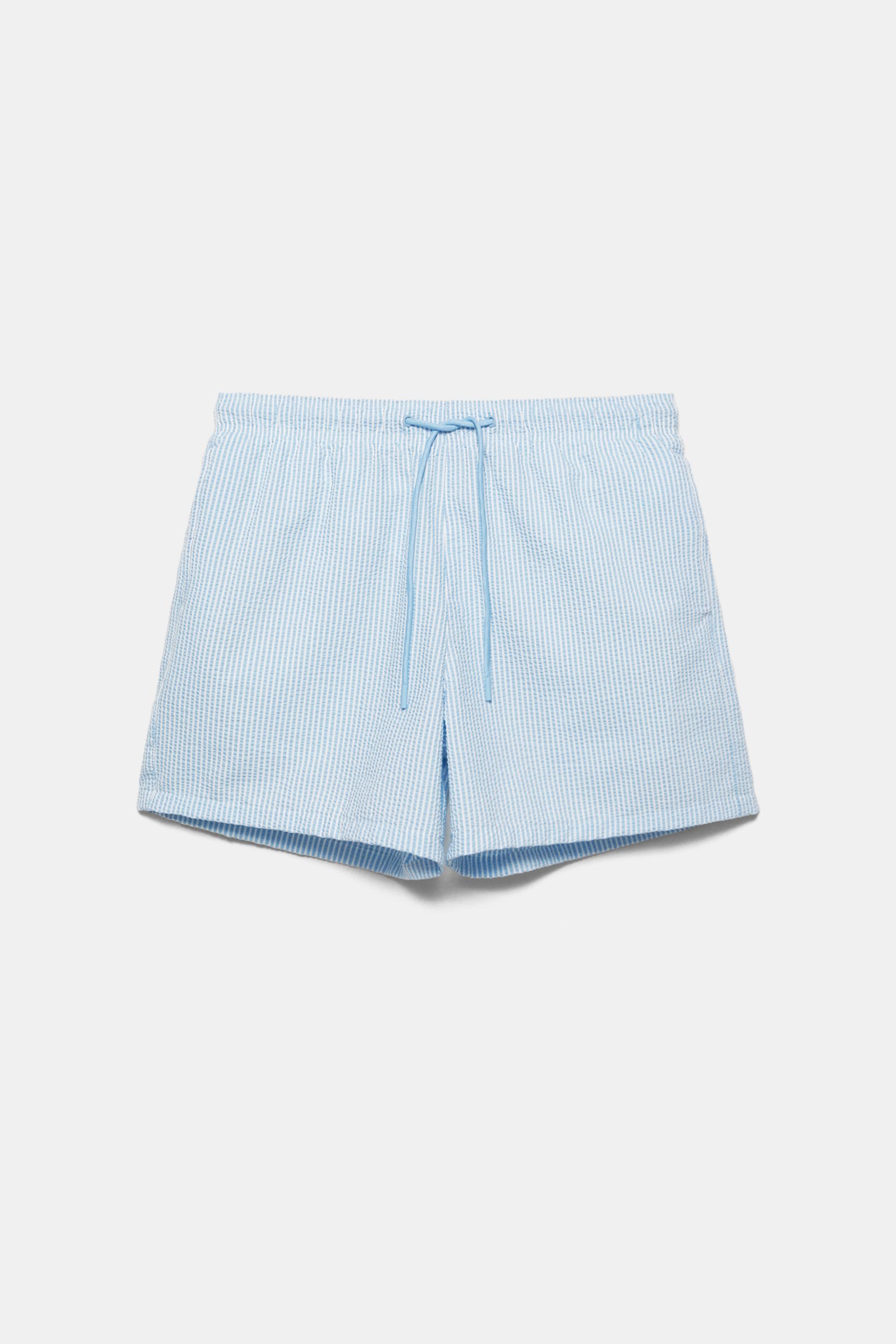 Striped seersucker swimming trunks — Blue