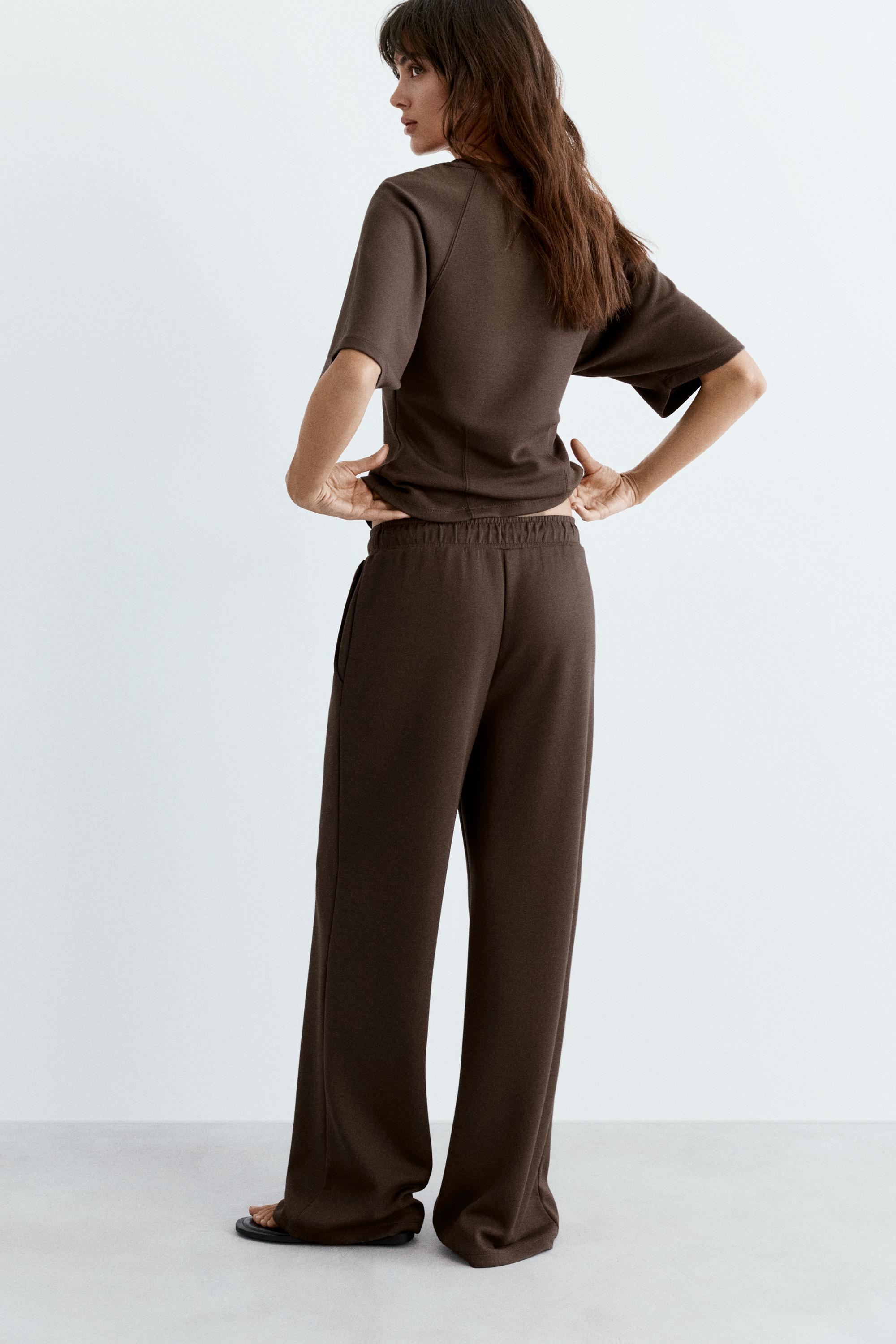 Soft-touch wide-leg trousers — Brown