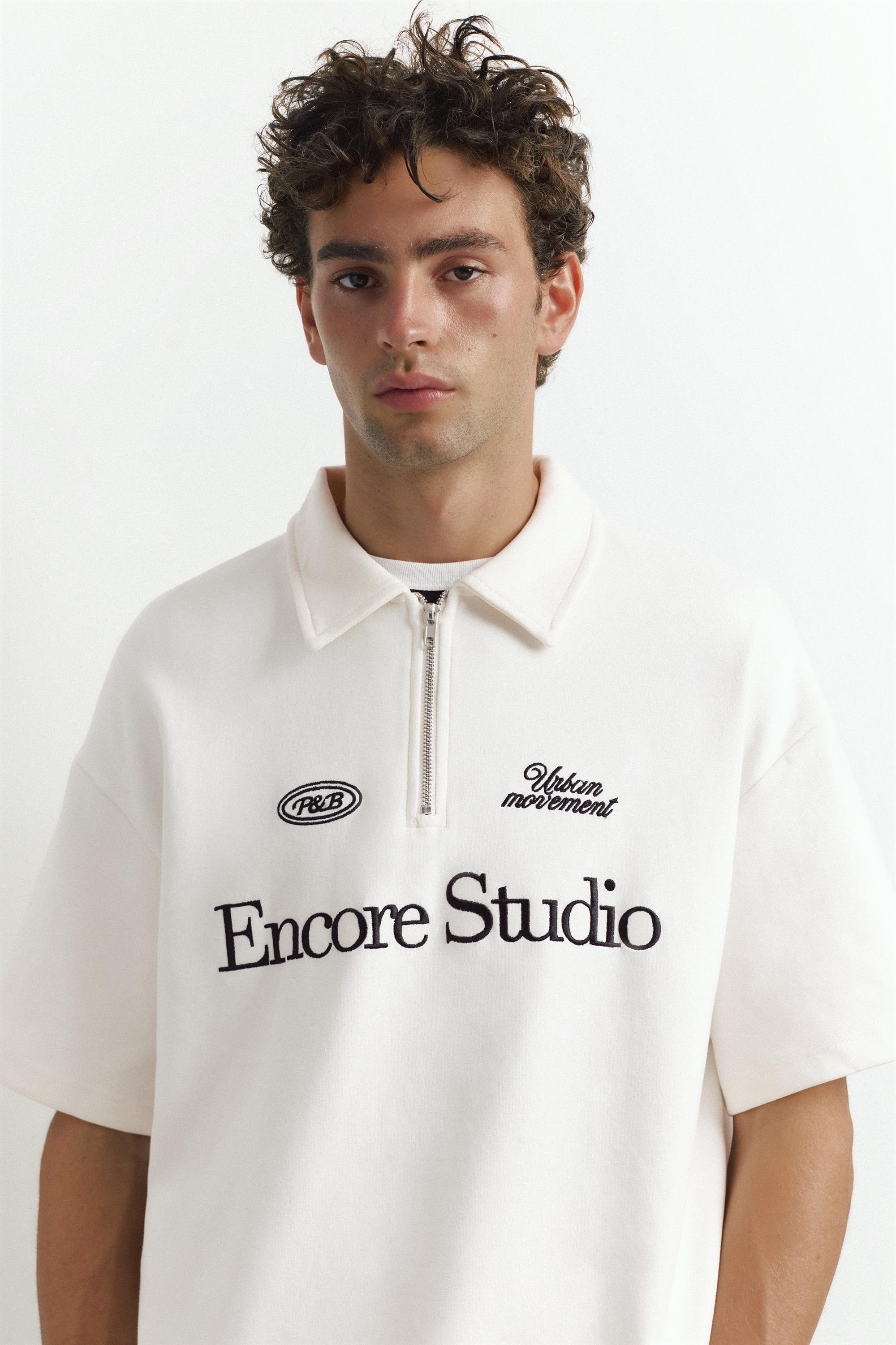 Graphic zip-up interlock polo shirt — Off white