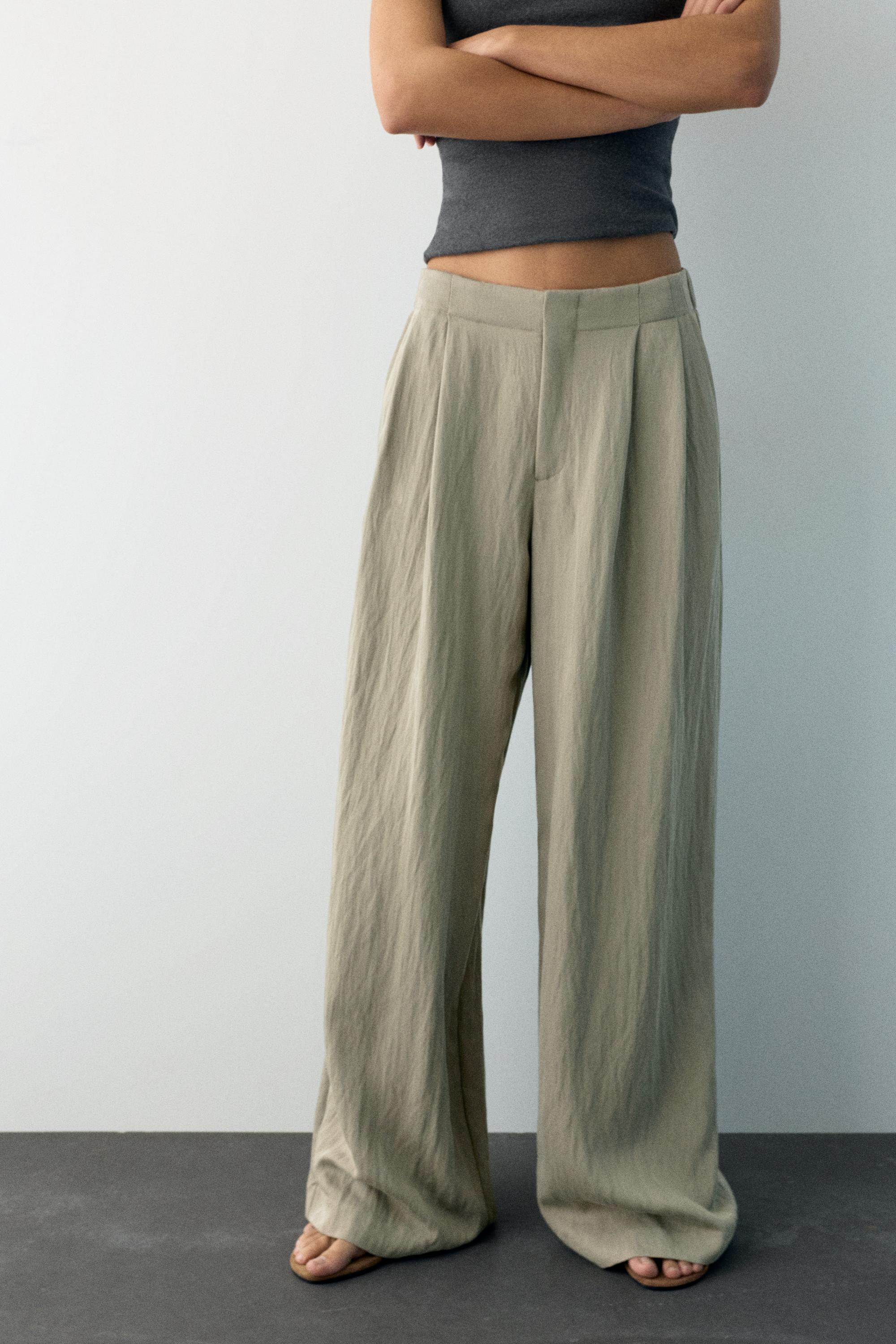 Düğmeli ve fermuarlı, kemer tokalı, önü pensli, elastik belli, tailored fit pantolon. - Görsel 39