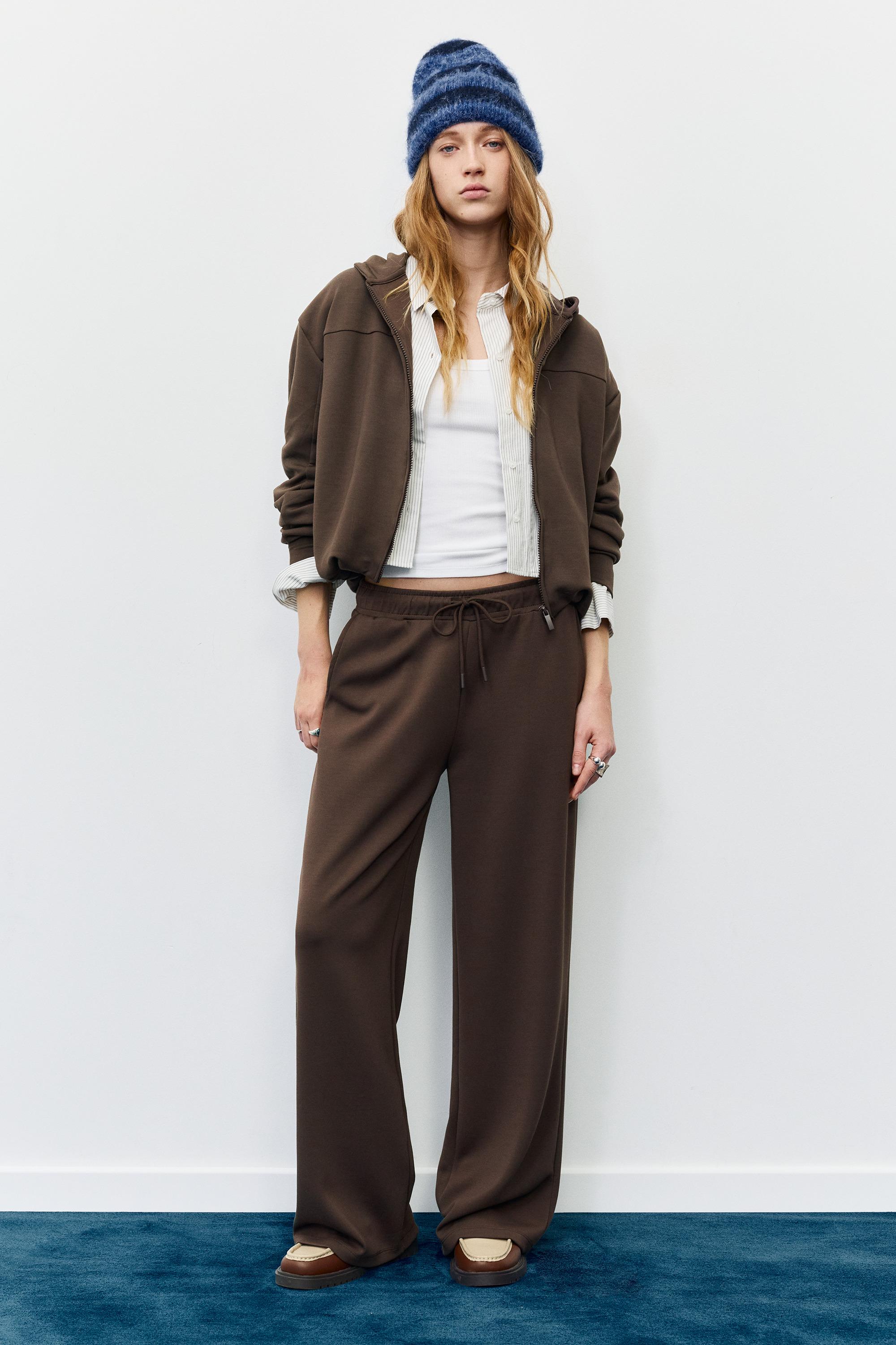 Soft-touch wide-leg trousers — Brown