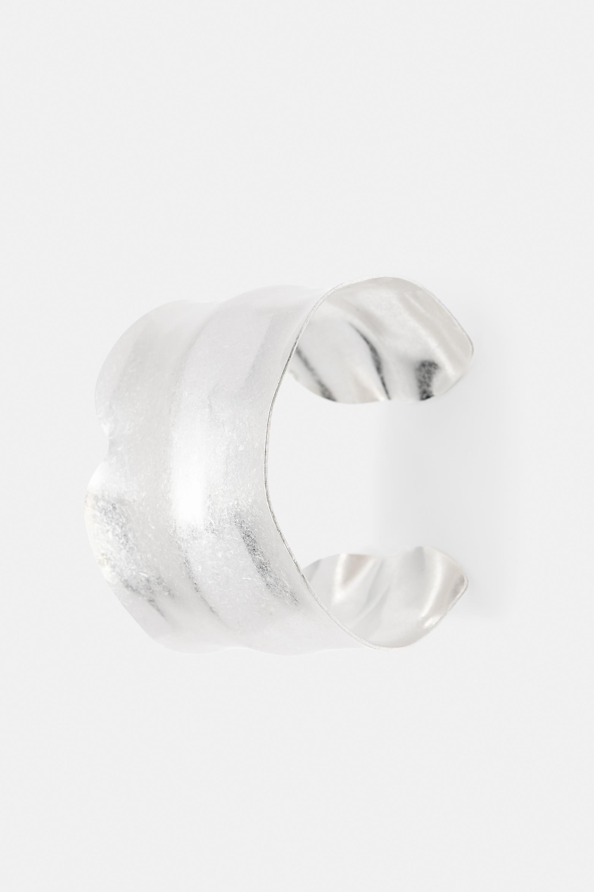 Irregular rigid arm cuff — Silver
