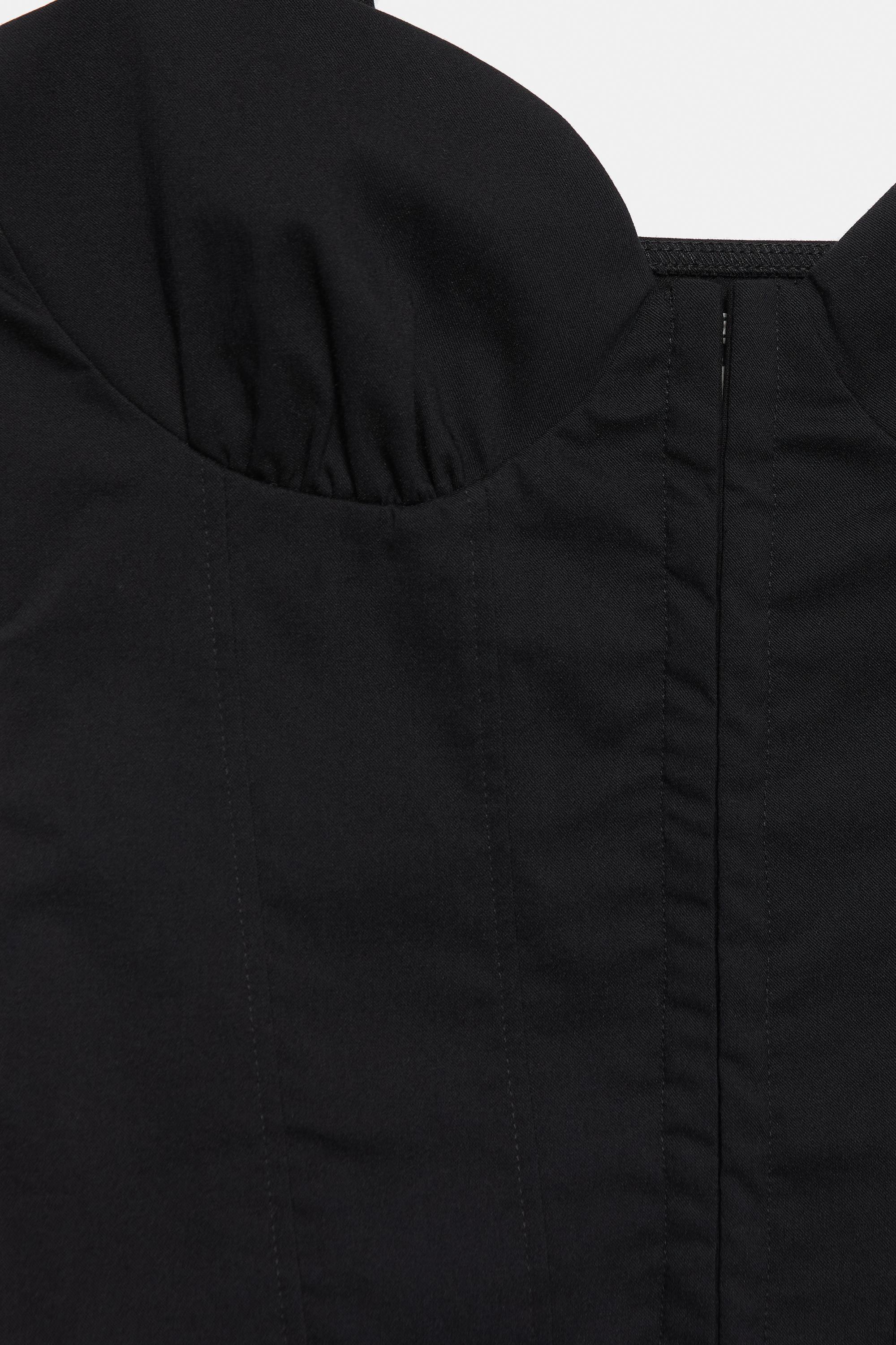 Strappy corsetry-inspired top — Black