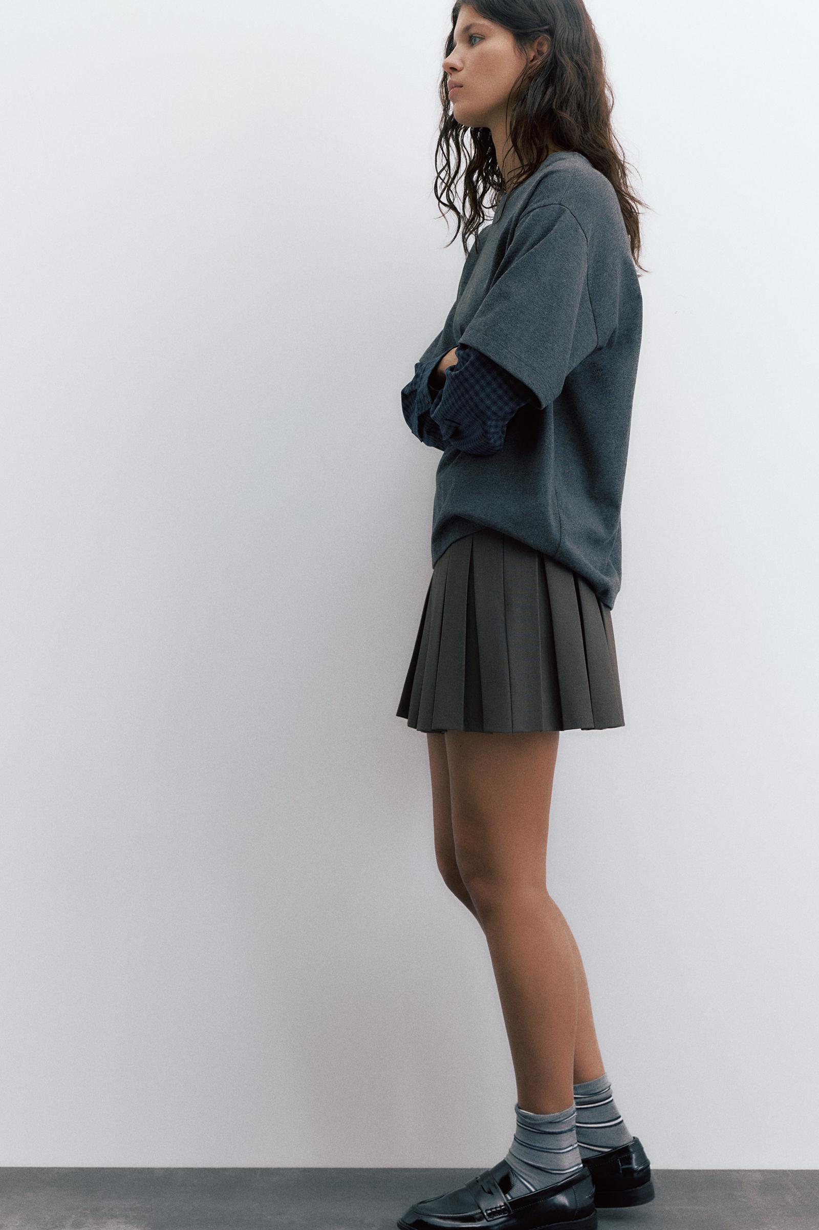 Pleated mini skirt — Grey marl