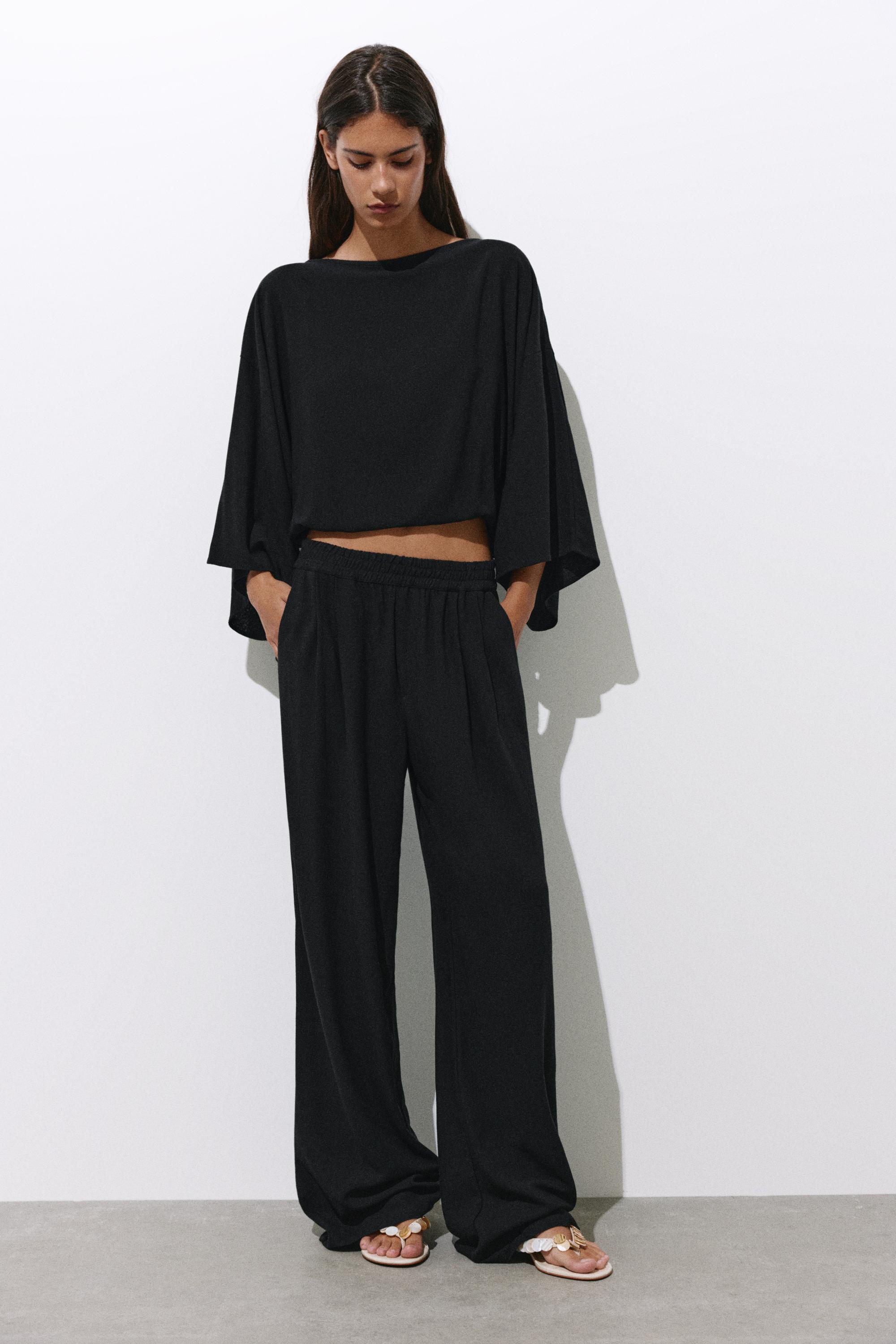 Flowing darted trousers — Black