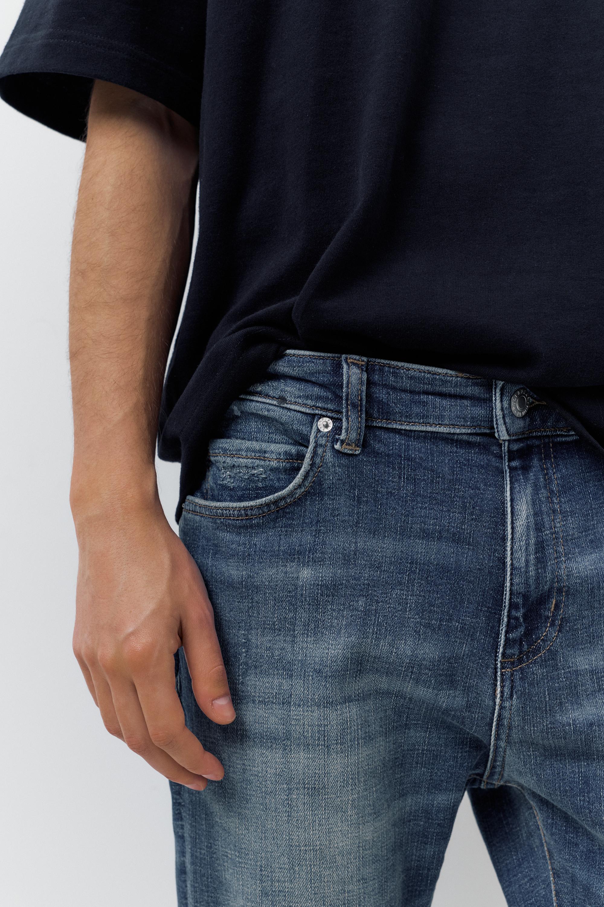 Ripped skinny jeans — Medium blue