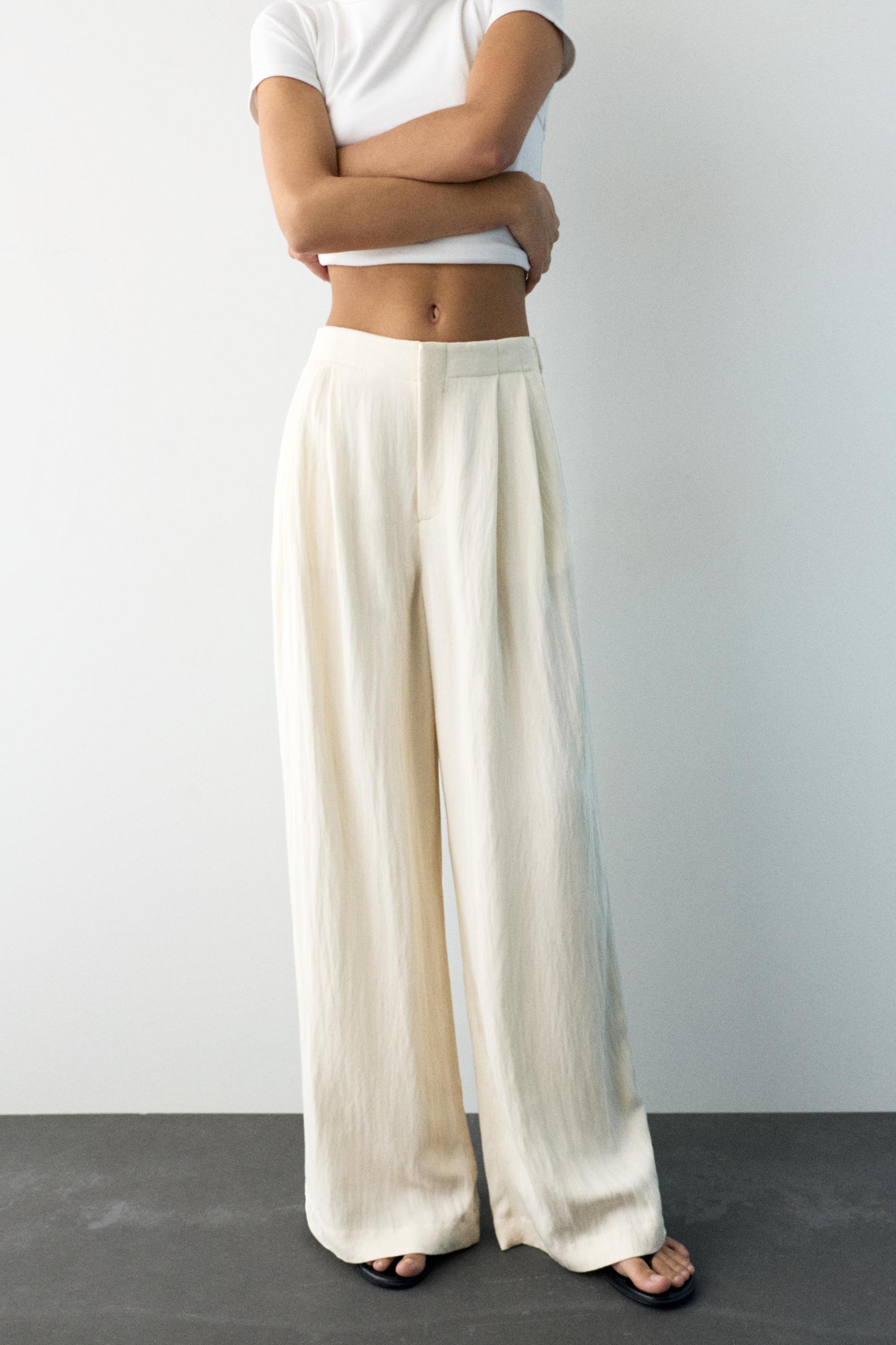 Düğmeli ve fermuarlı, kemer tokalı, önü pensli, elastik belli, tailored fit pantolon. - Görsel 27