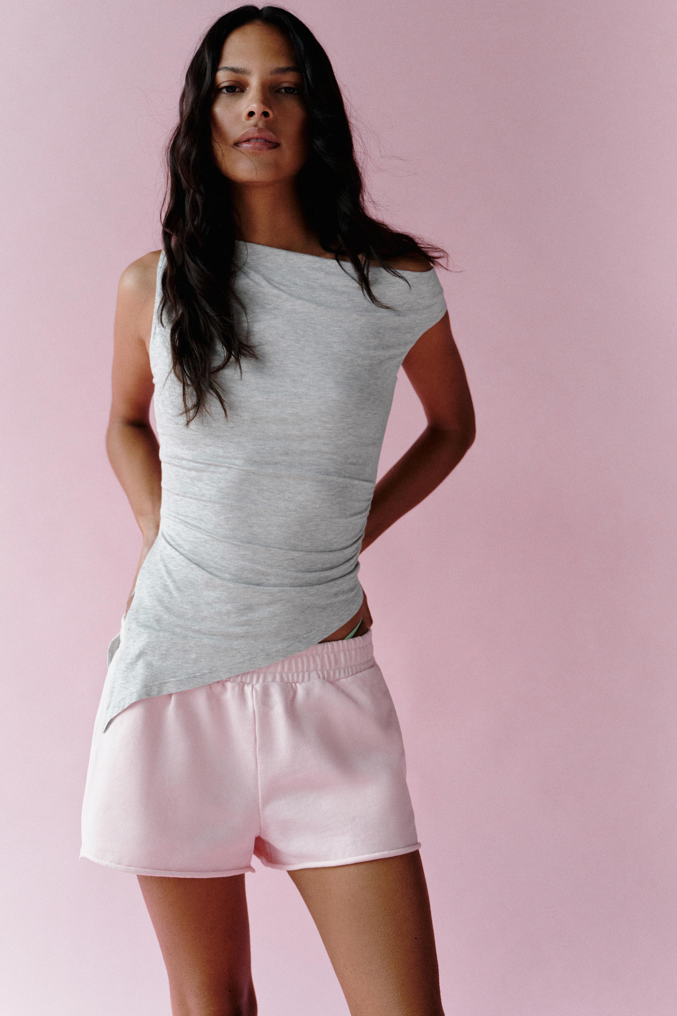 Asymmetric top — Grey marl