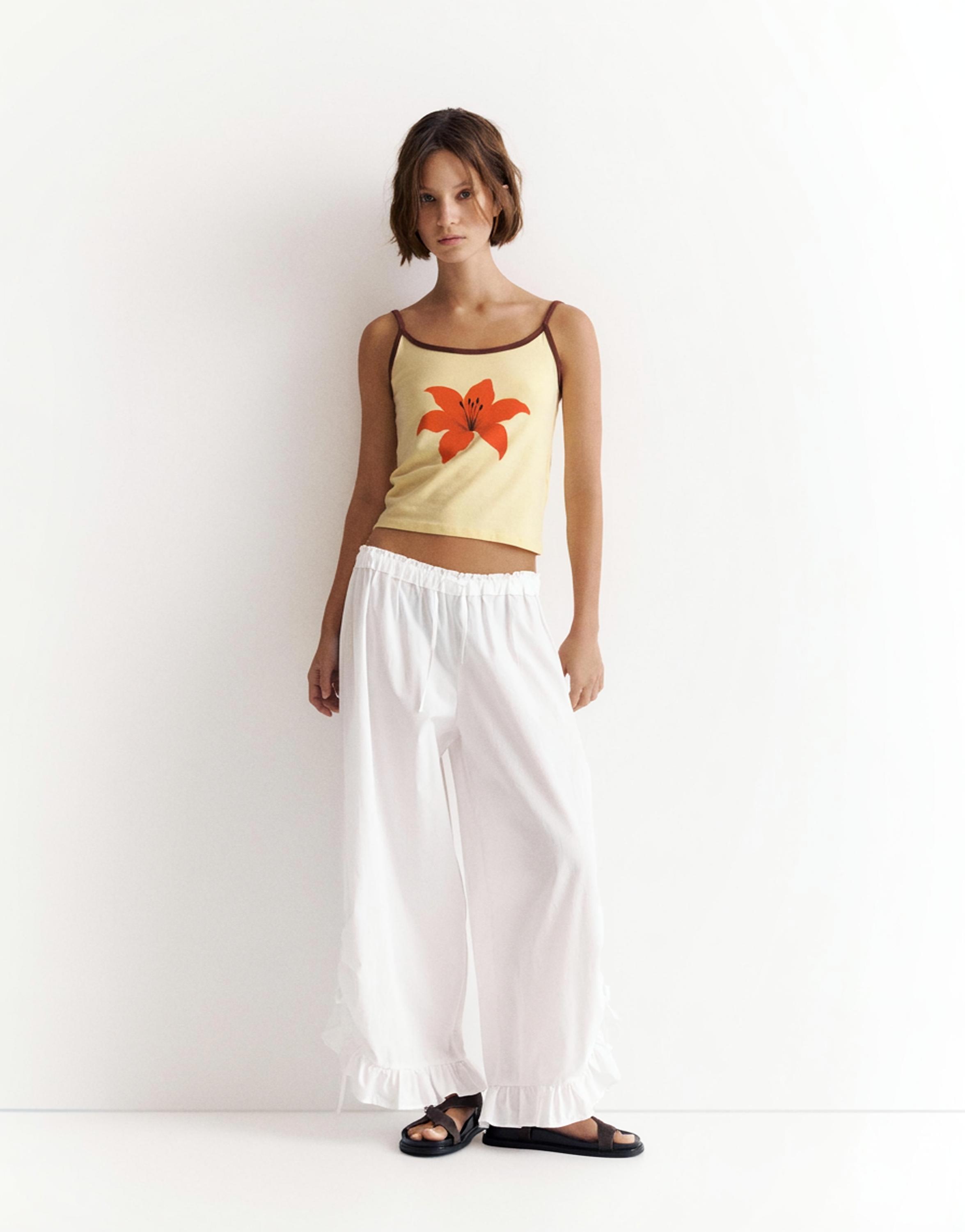 Hibiscus flower strappy top — Yellow