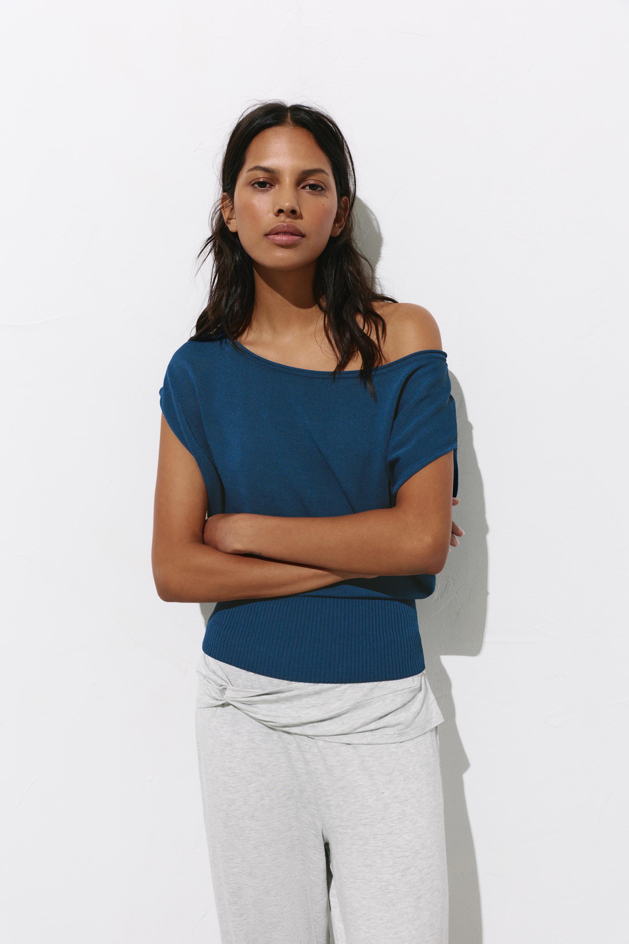Short sleeve asymmetric knit top — Indigo
