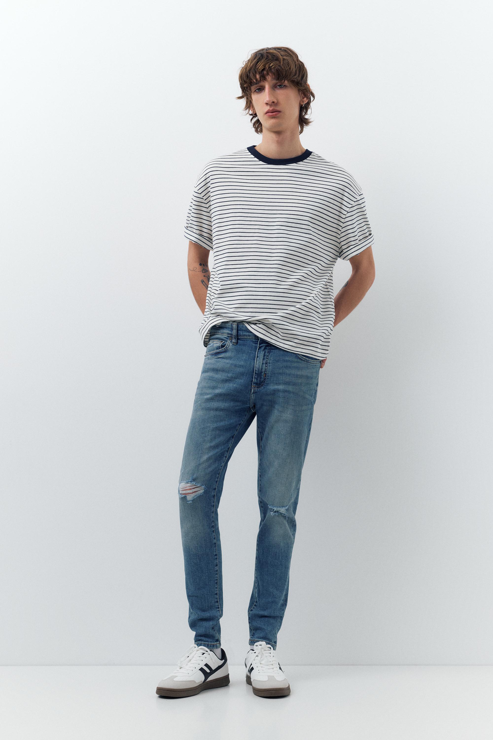 Ripped skinny jeans — Medium blue