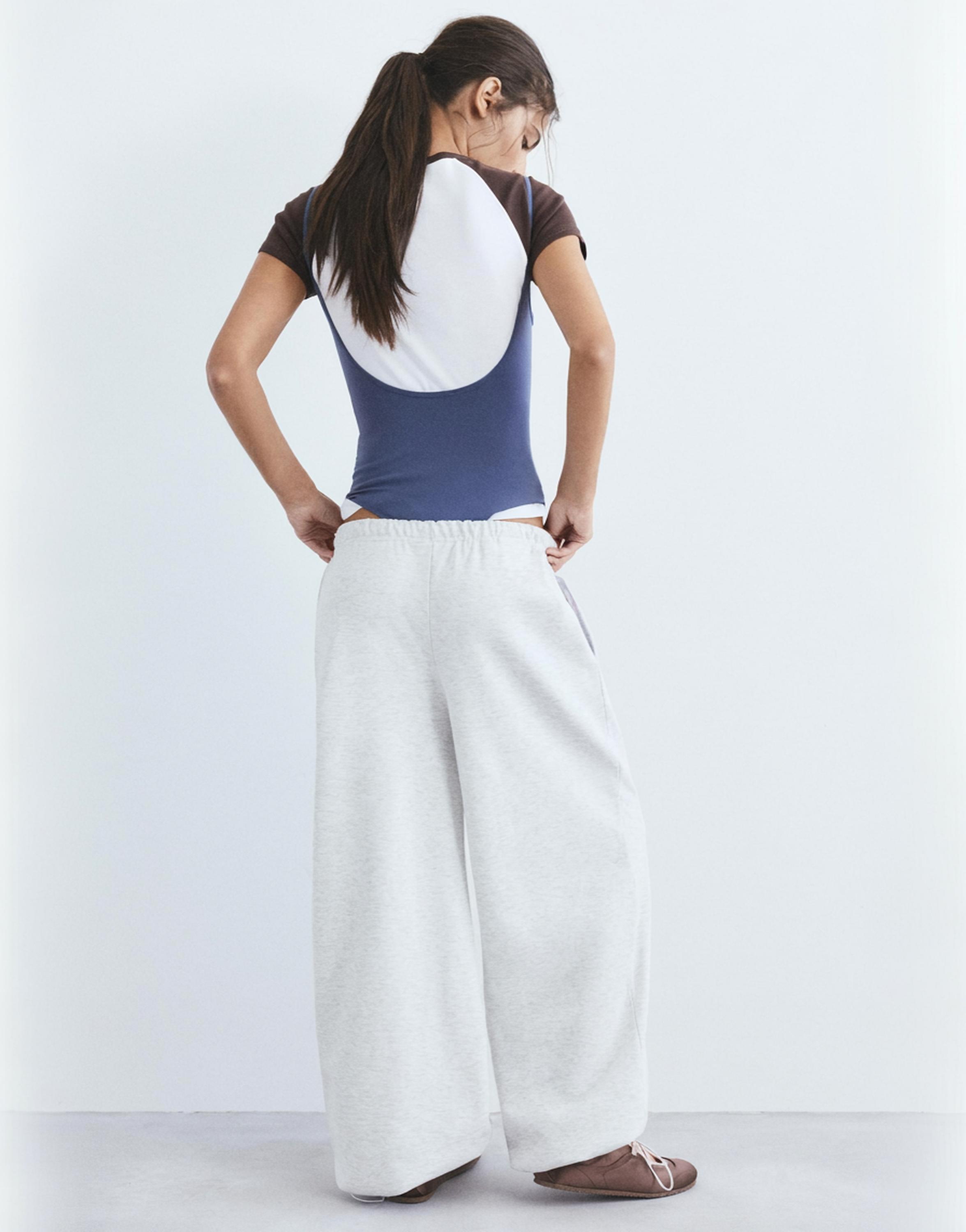 Wide-leg tracksuit bottoms with adjustable hem — Grey marl