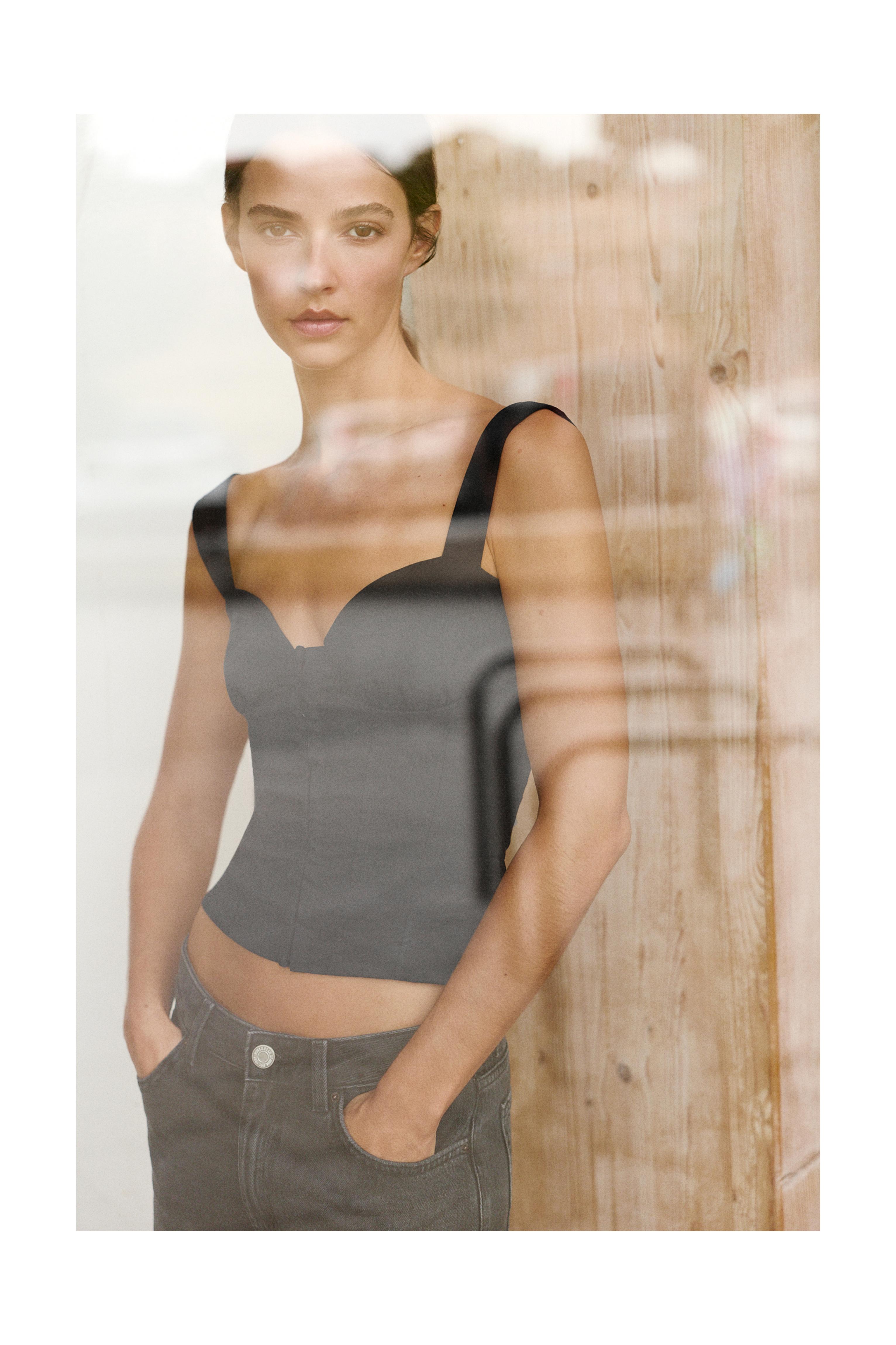 Strappy corsetry-inspired top — Black