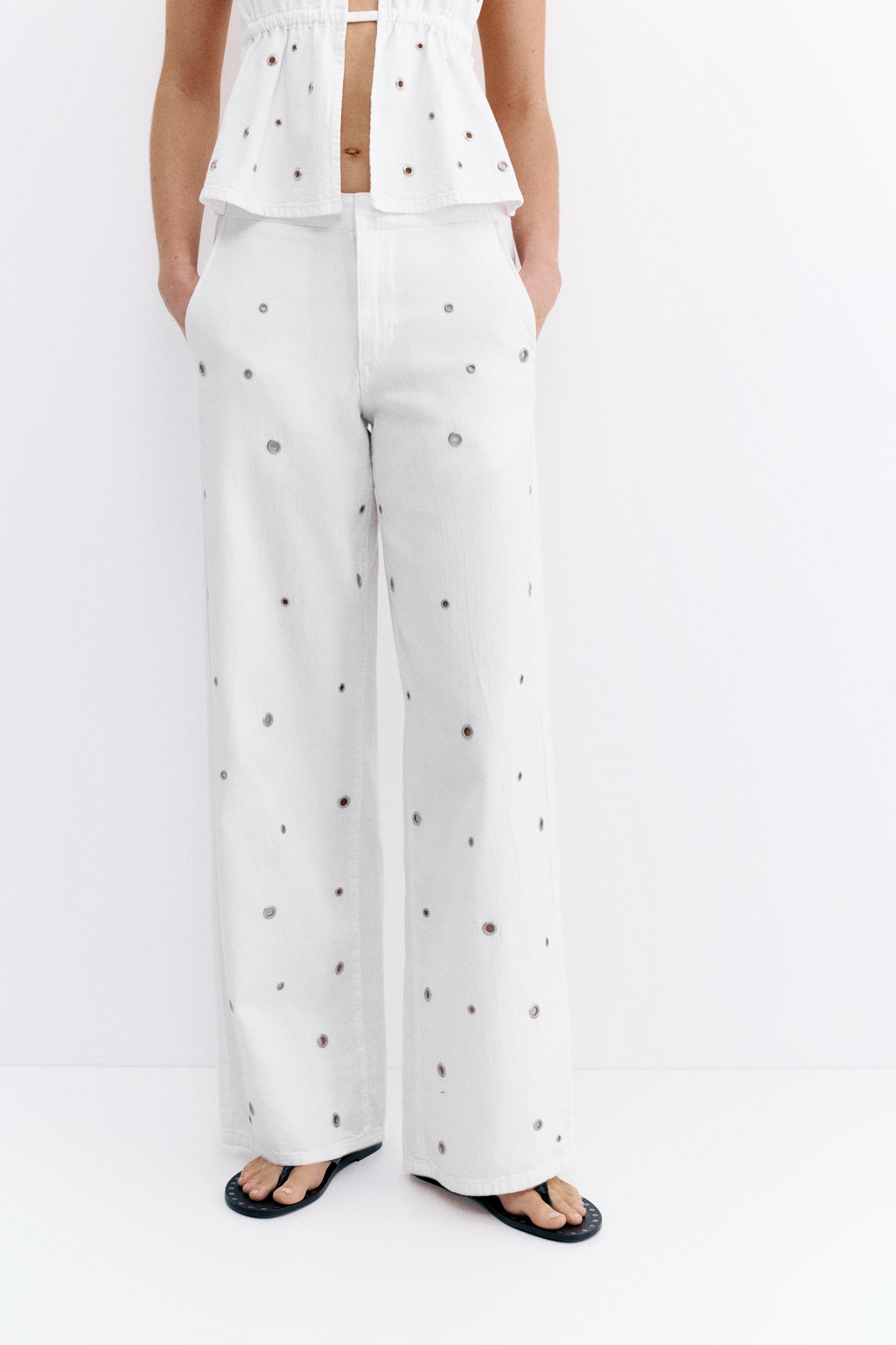 Straight-leg jeans with eyelets — White