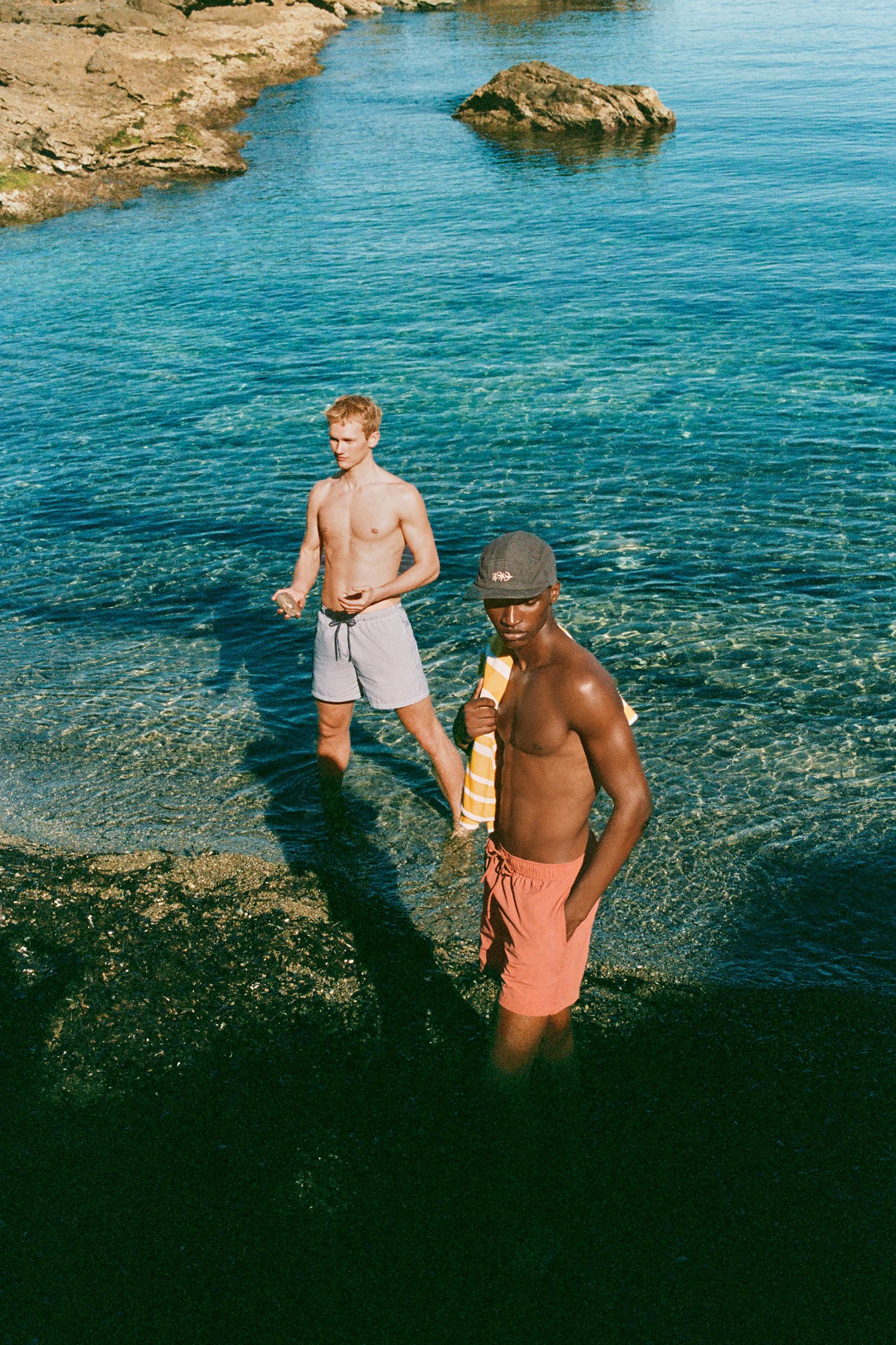 Striped seersucker swimming trunks — Blue