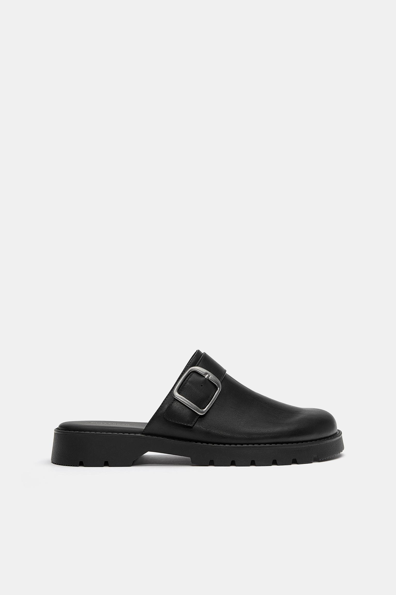 Buckle clogs — Black