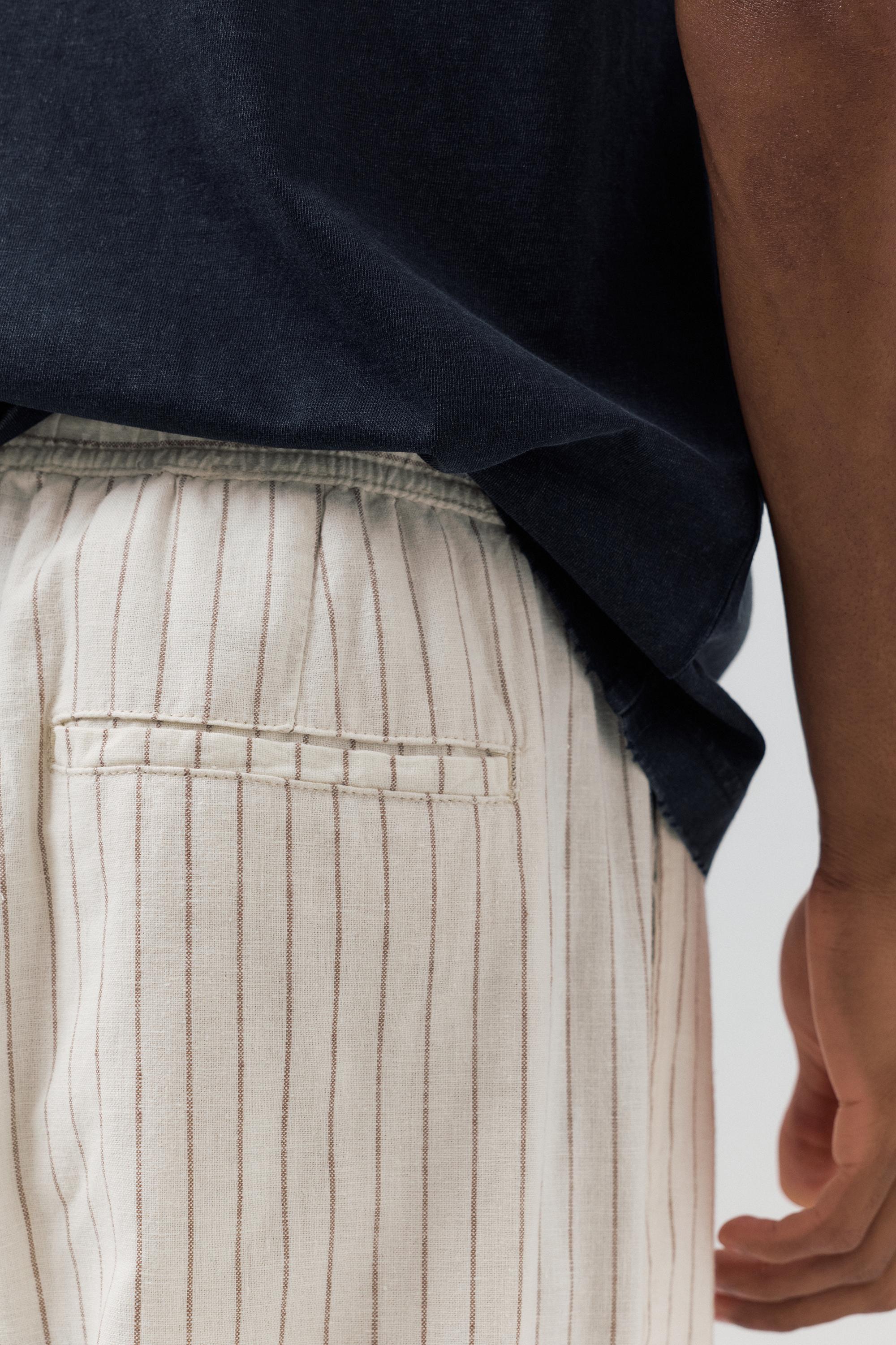Linen blend jogger trousers — Striped