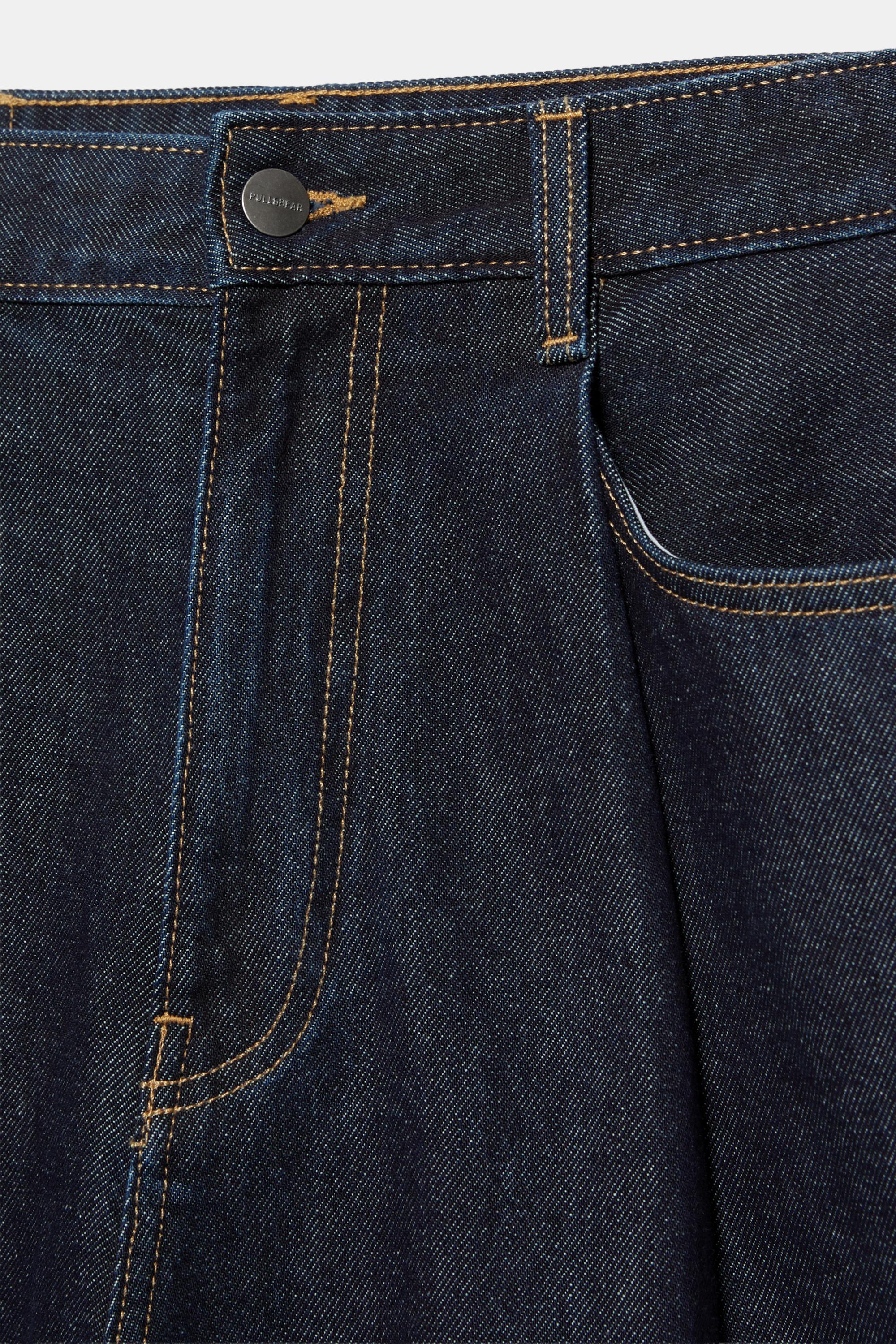 Pens detaylı geniş paça denim bermuda