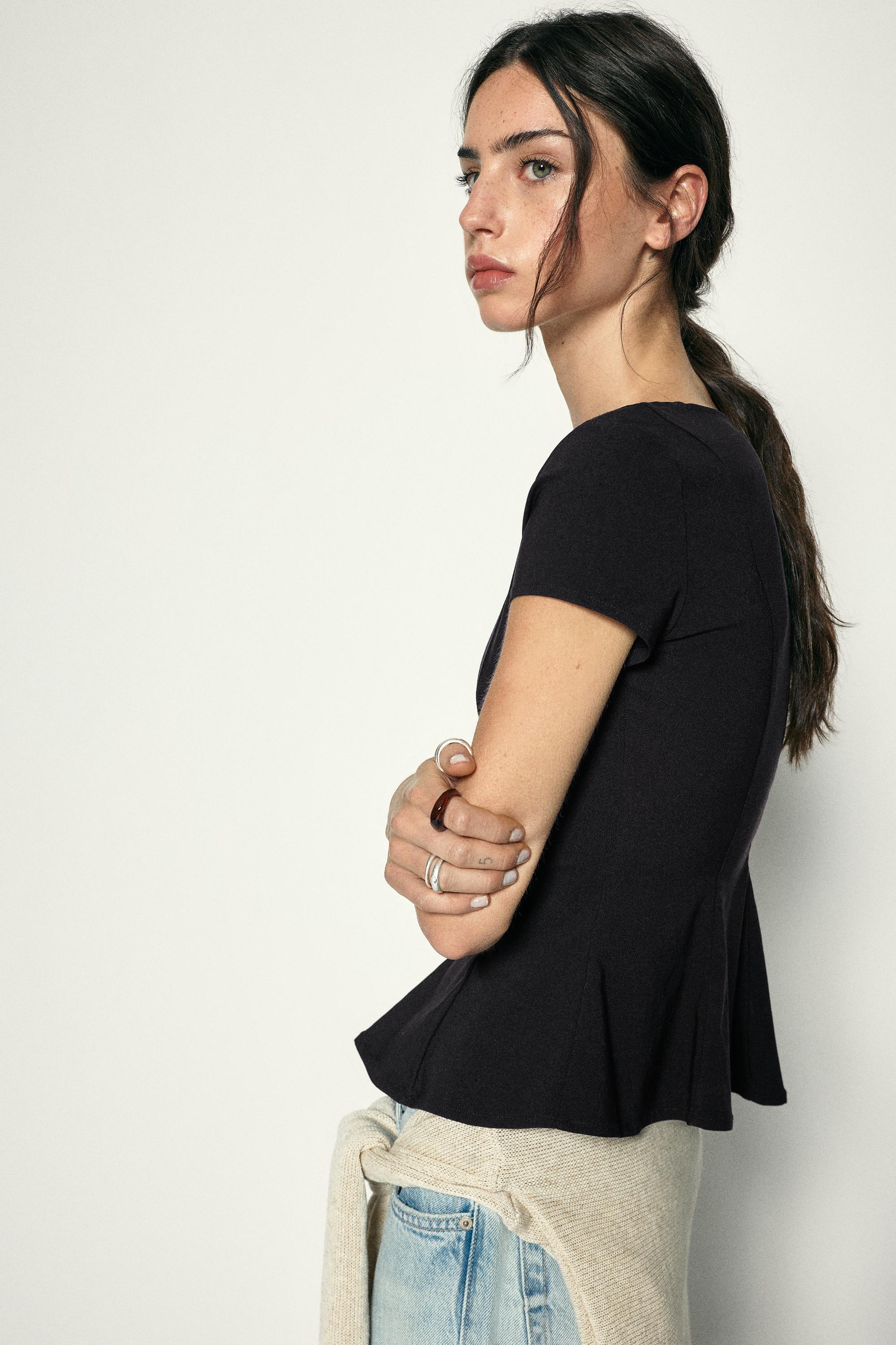Peplum top — Black