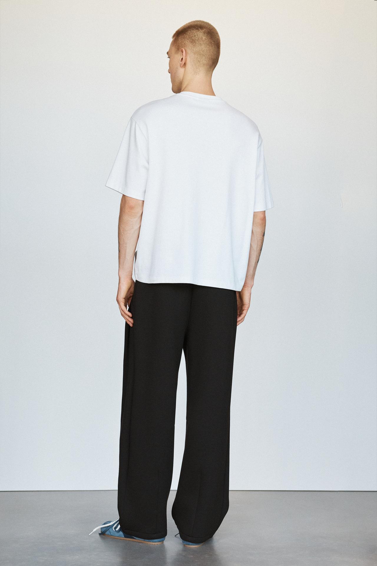 Neoprene-effect darted trousers — Black