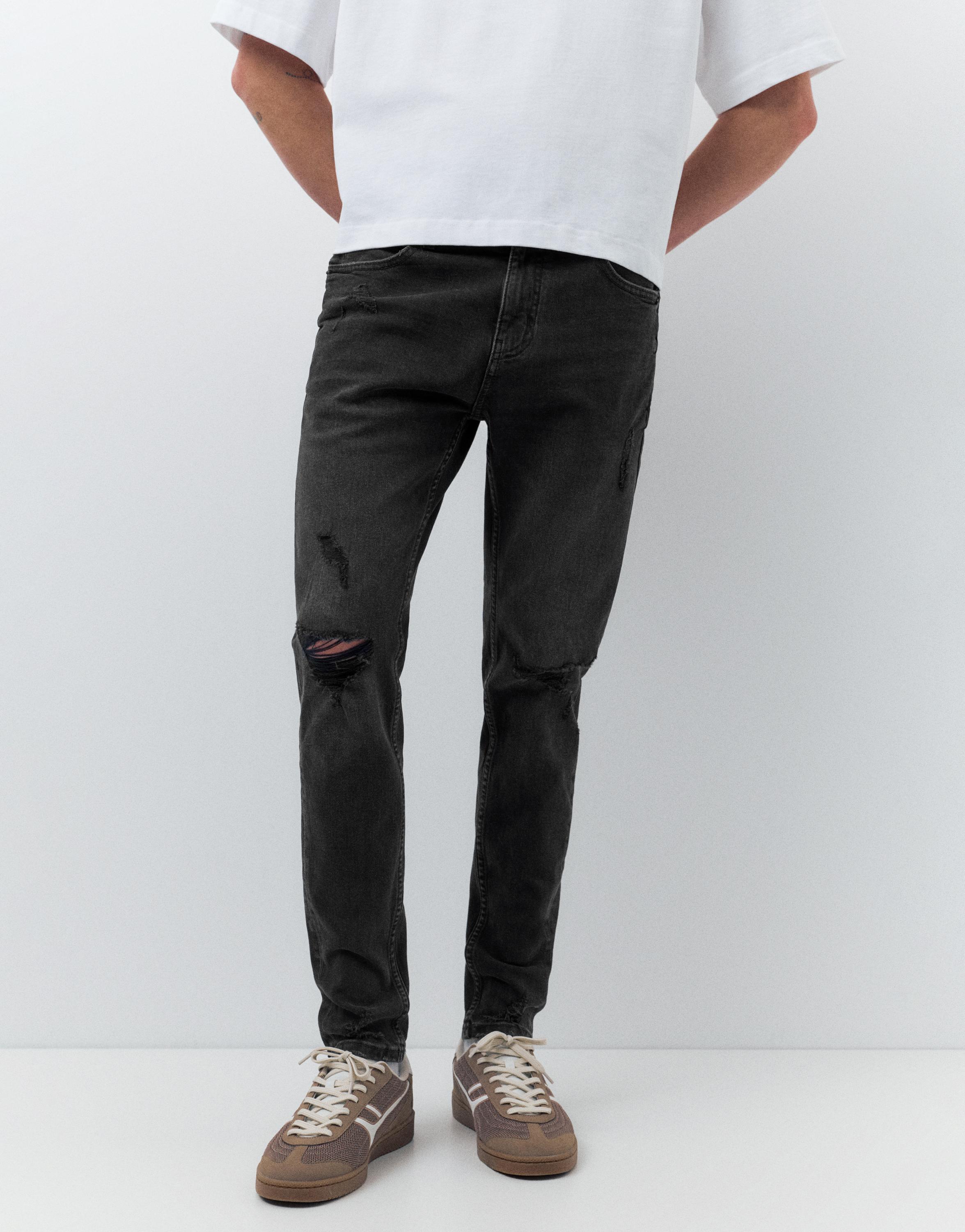 Ripped skinny jeans — Faded black