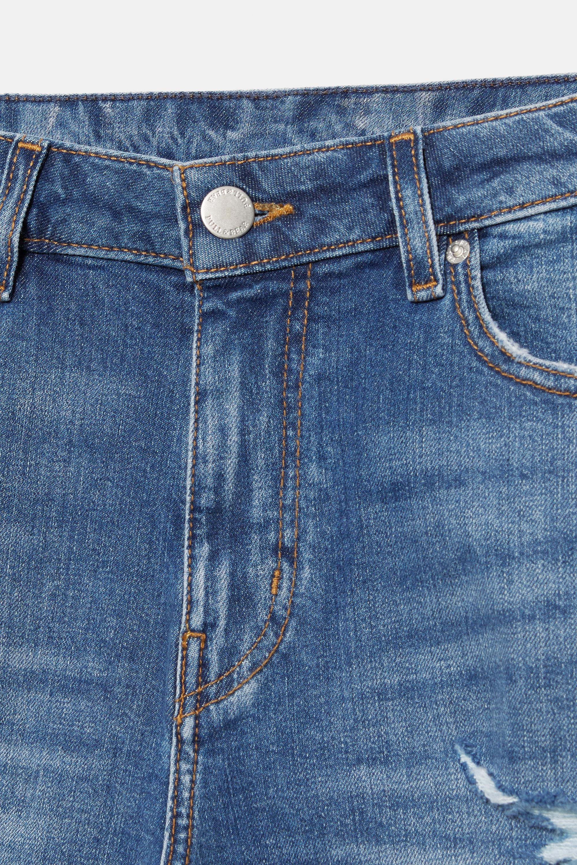 Ripped denim Bermuda shorts — Medium blue