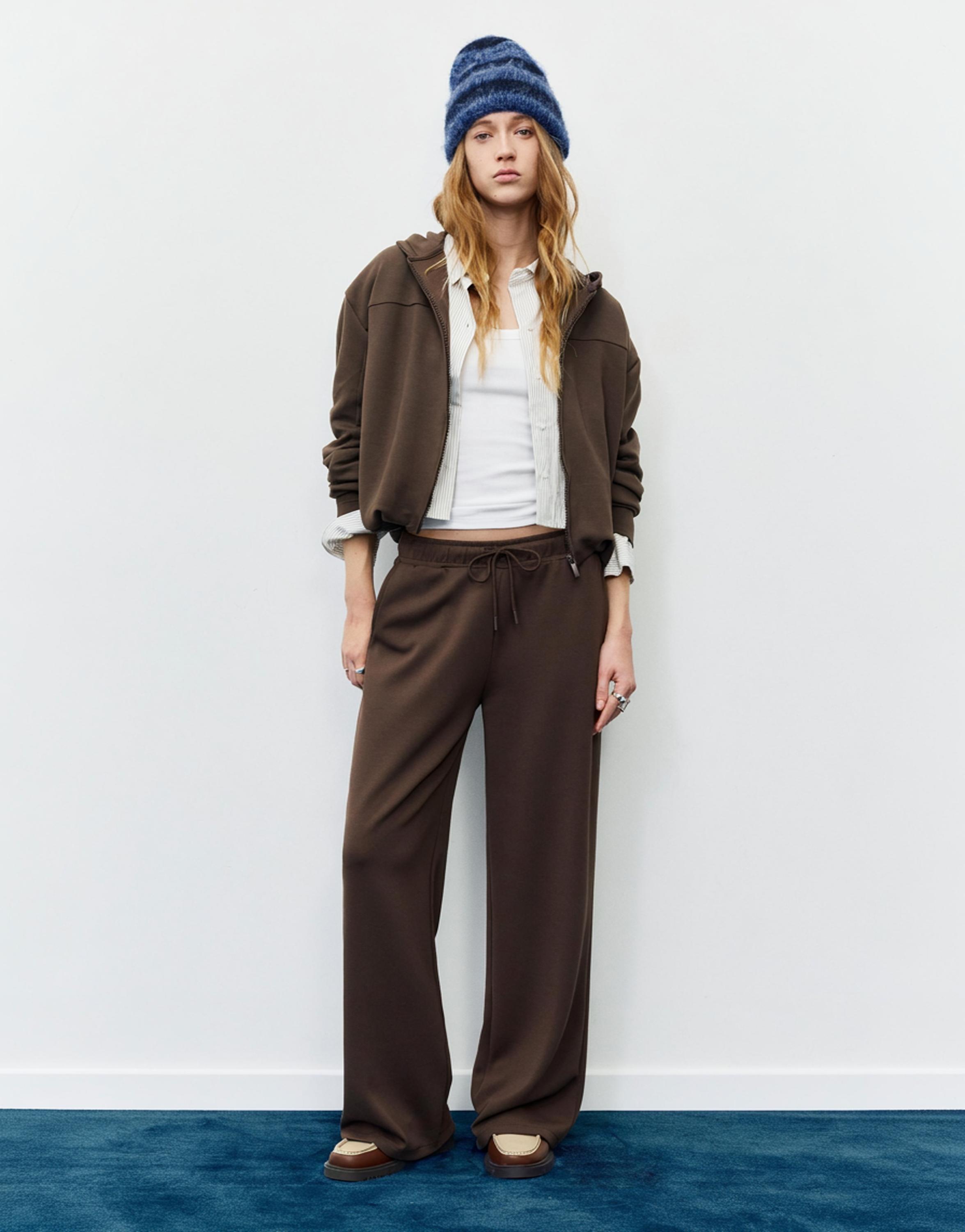 Soft-touch wide-leg trousers — Brown