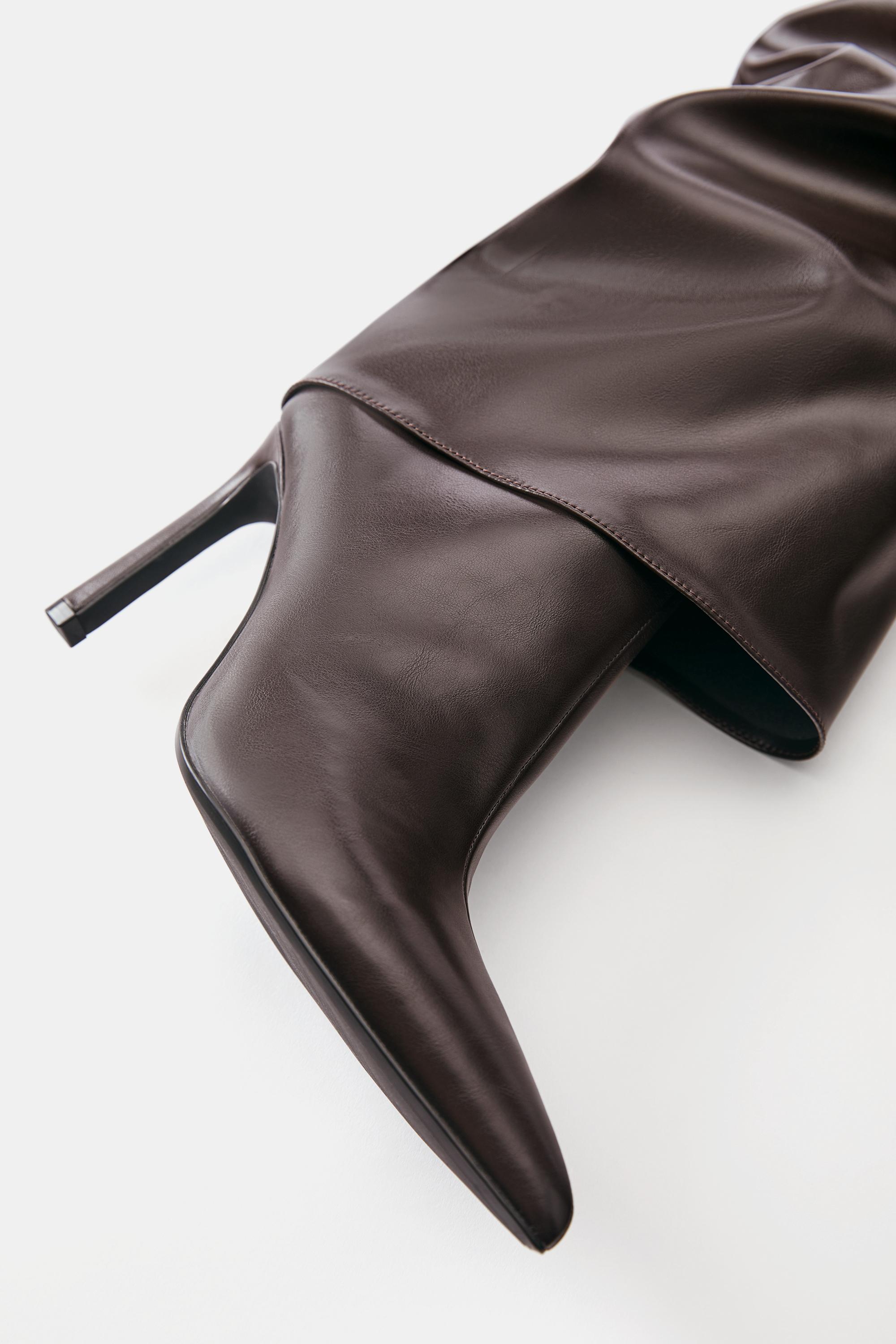 Heeled footed leggings boots — Brown