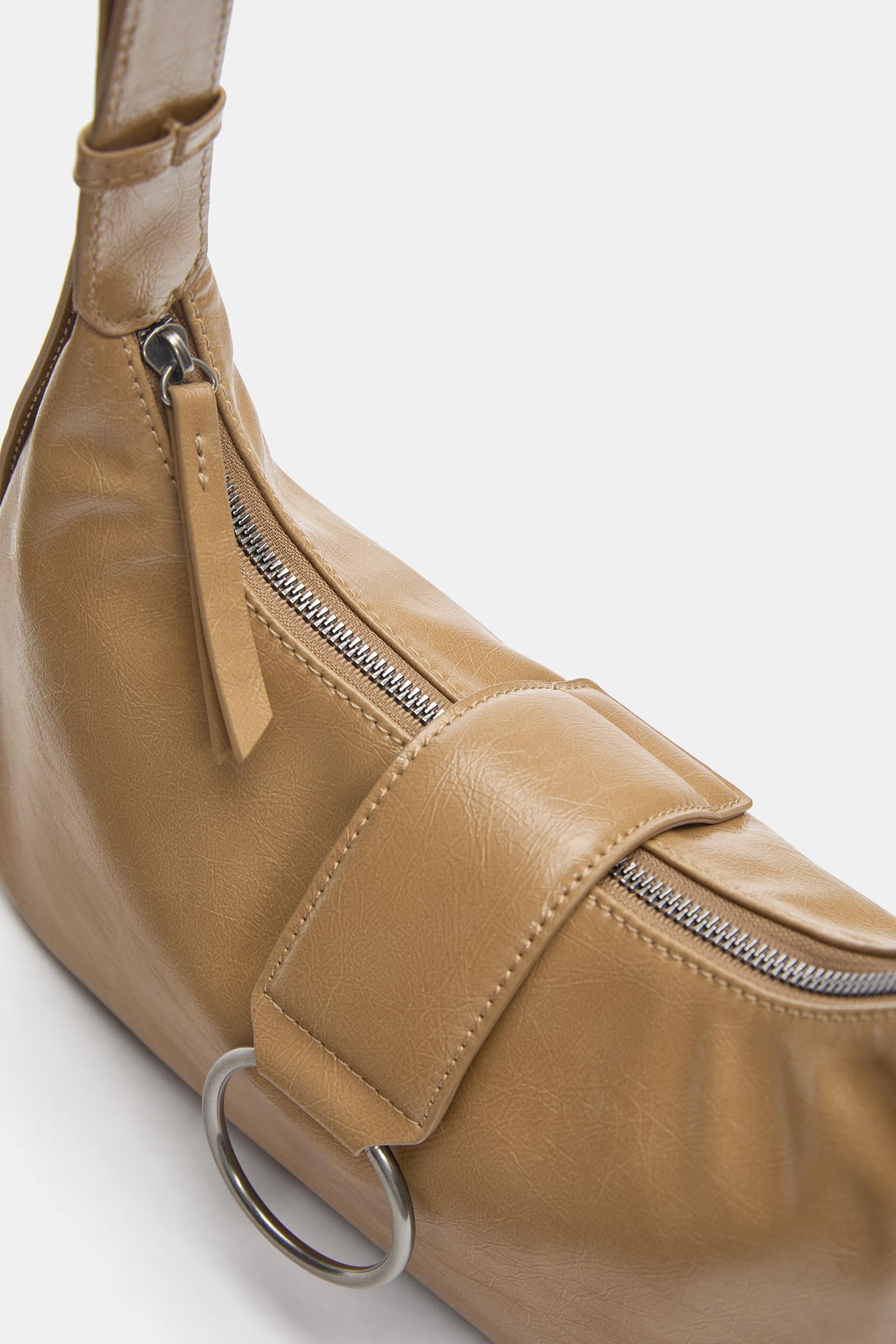 Crossbody bag with buckle — Leather