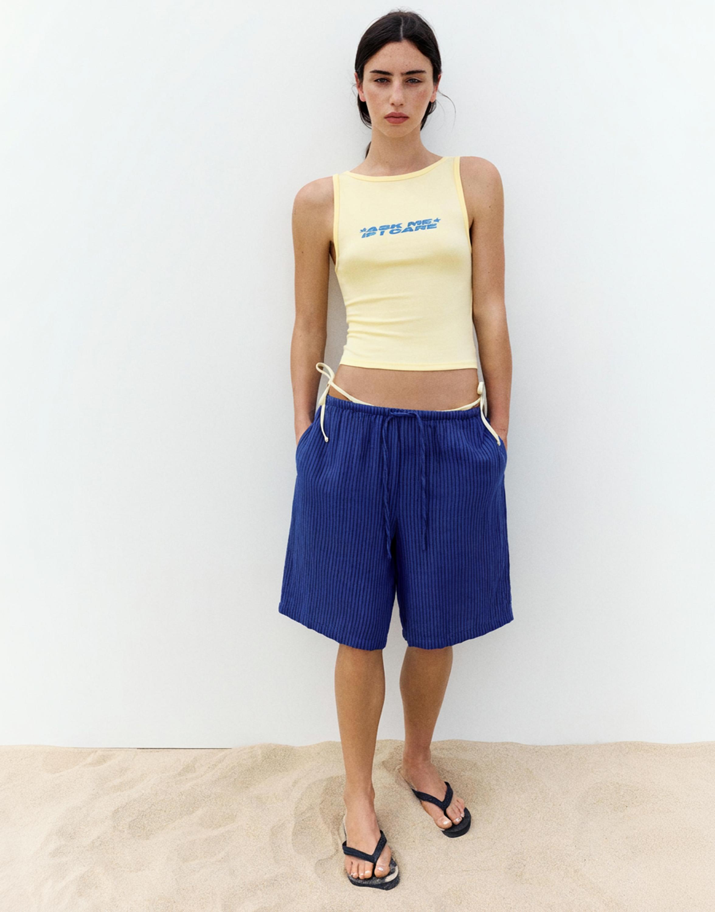 Yellow slogan tank top — Pale yellow