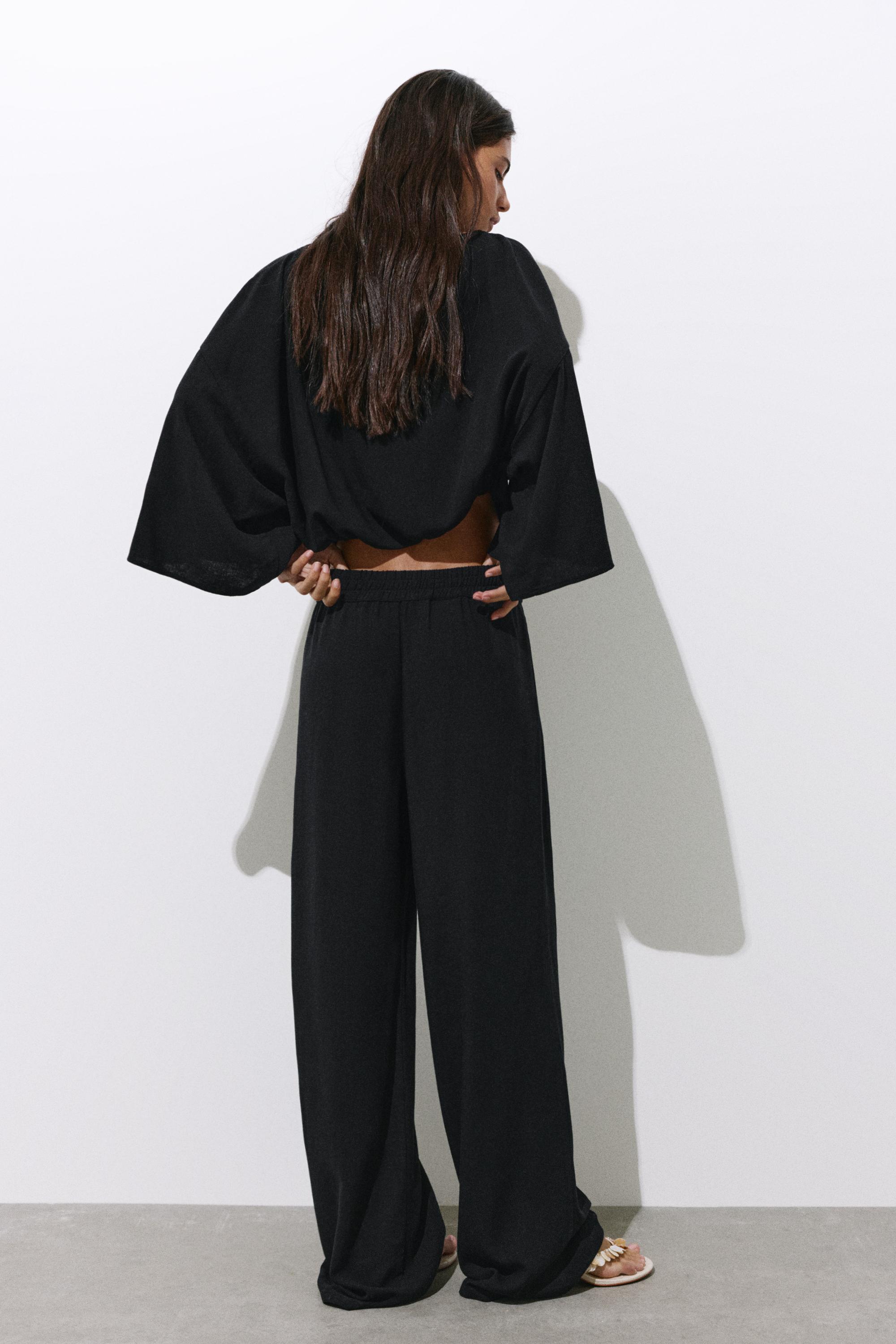 Flowing darted trousers — Black