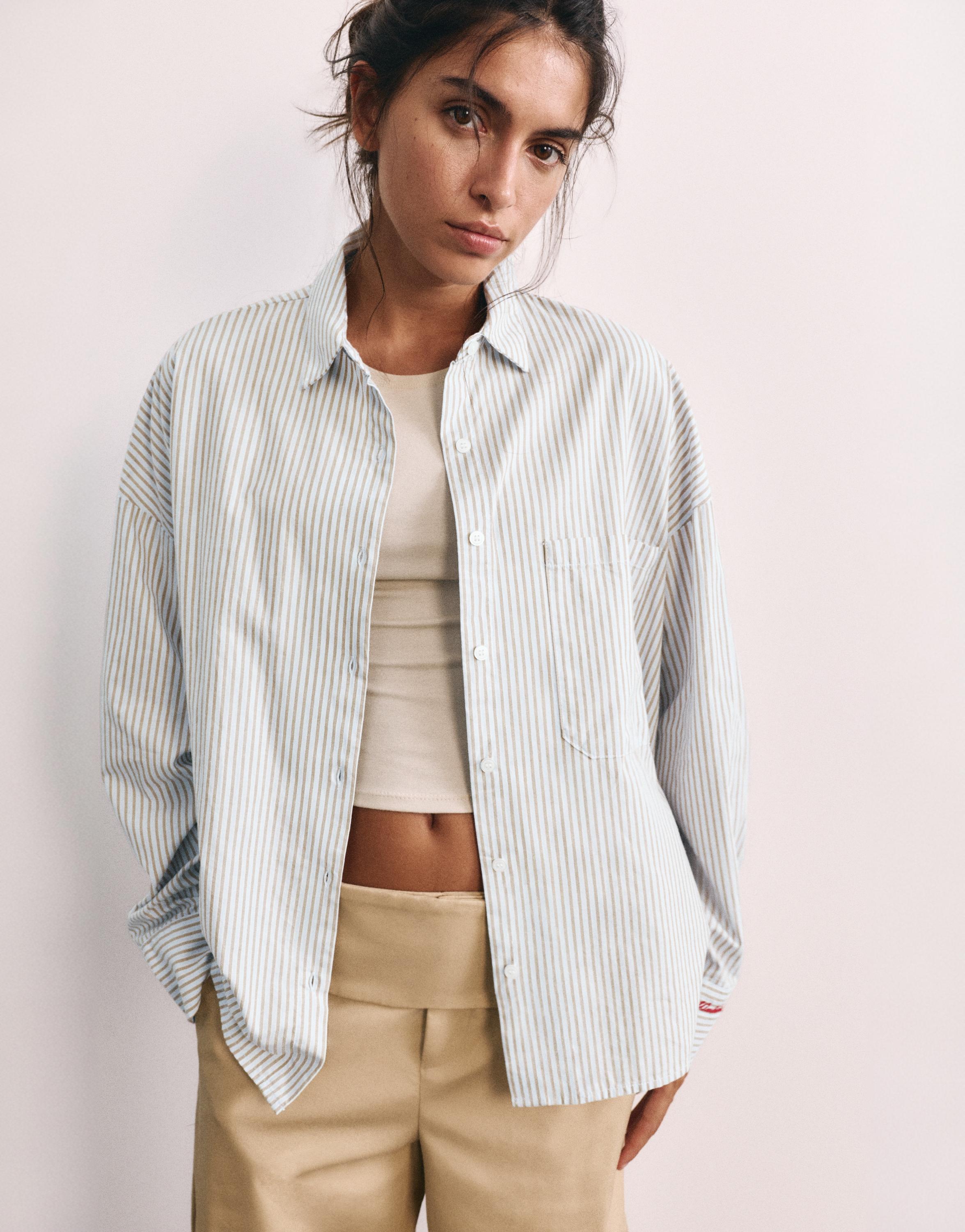 Embroidered striped shirt — Pastel blue