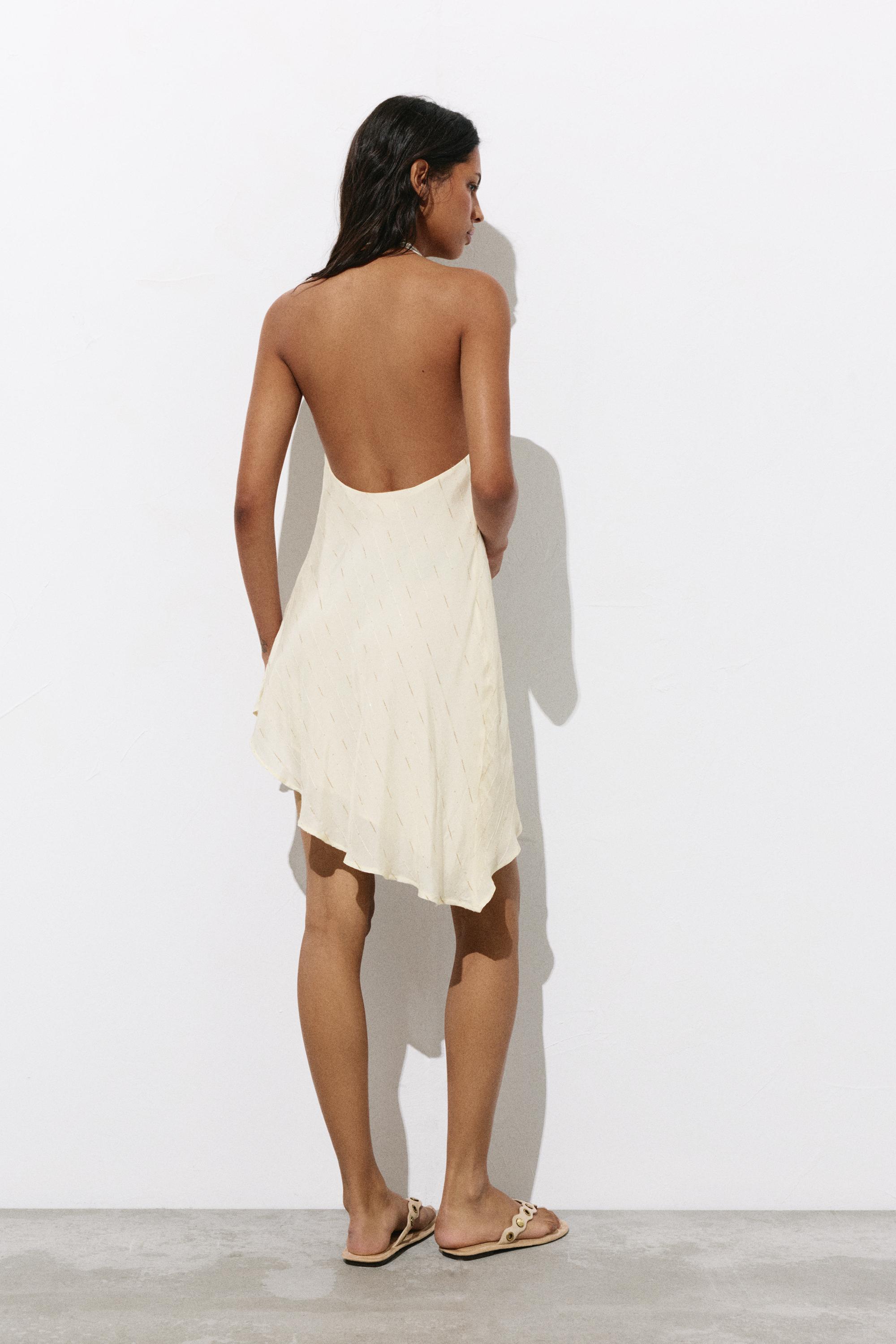 Short asymmetric halter dress — Ecru