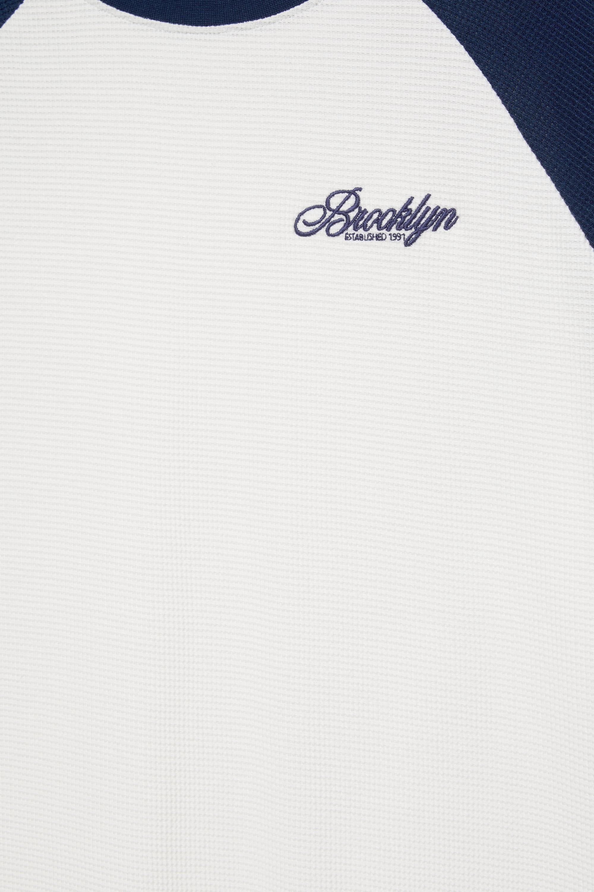 Embroidered raglan sleeve T-shirt — Navy