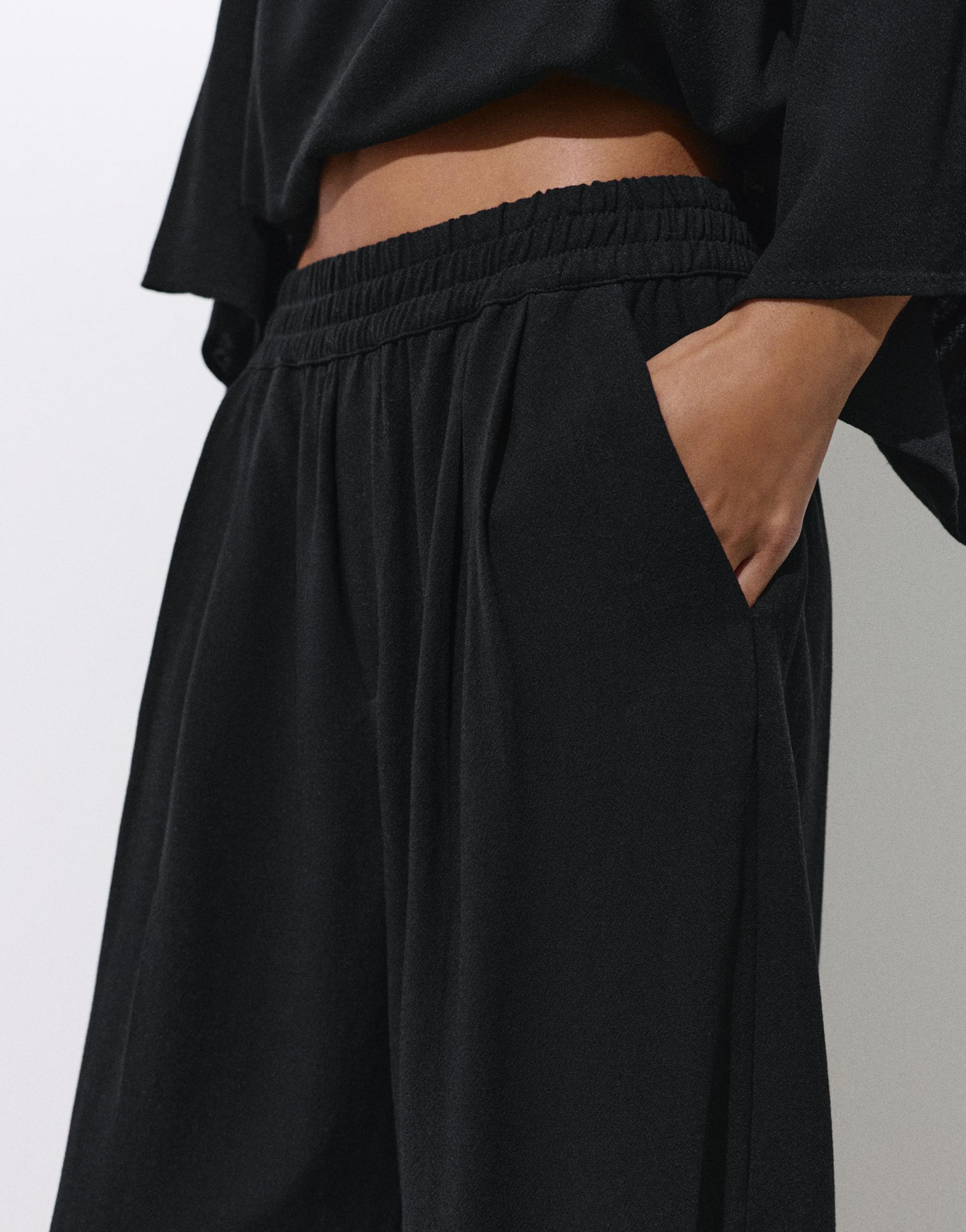 Flowing darted trousers — Black