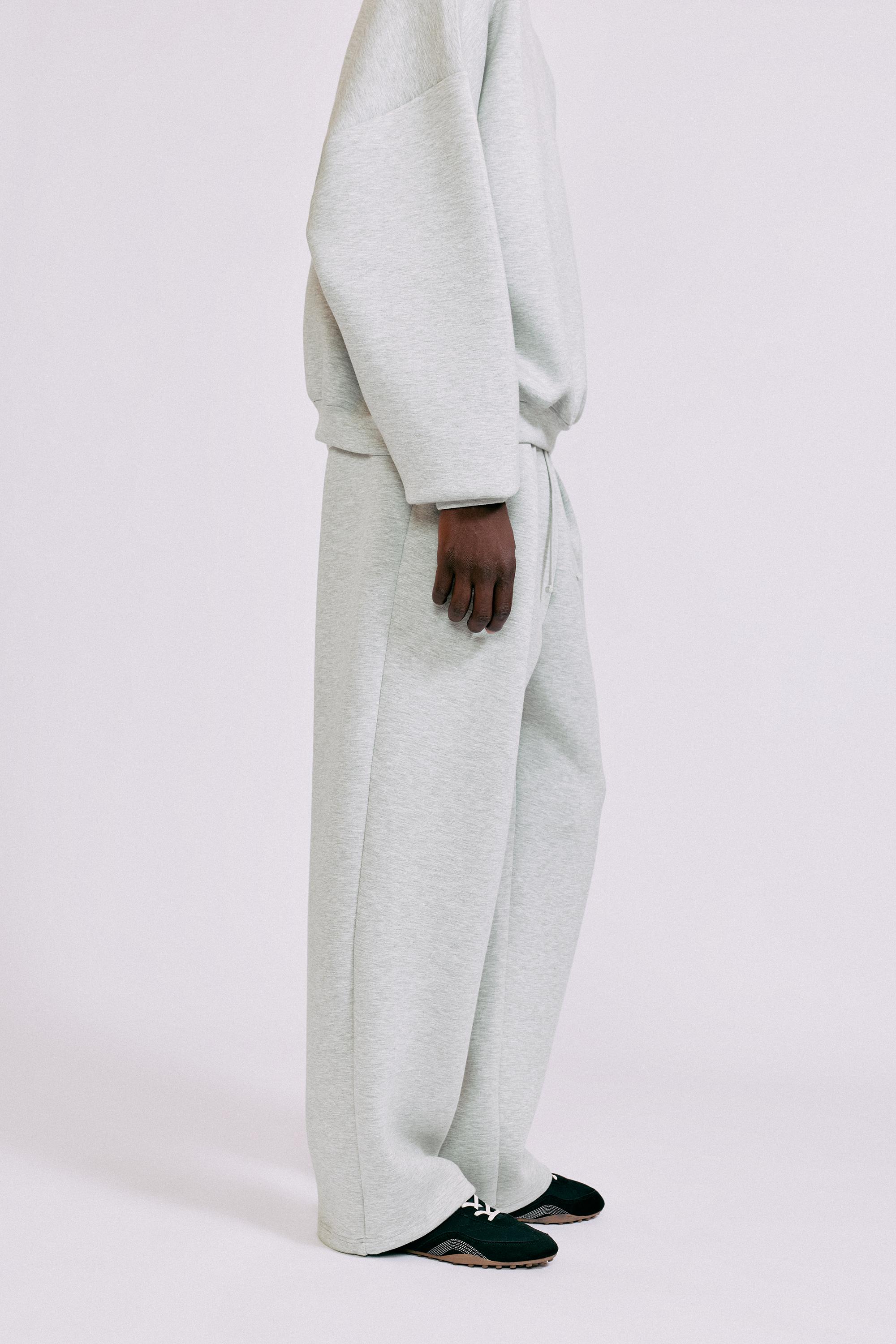 Interlock jogging pants — Grey marl
